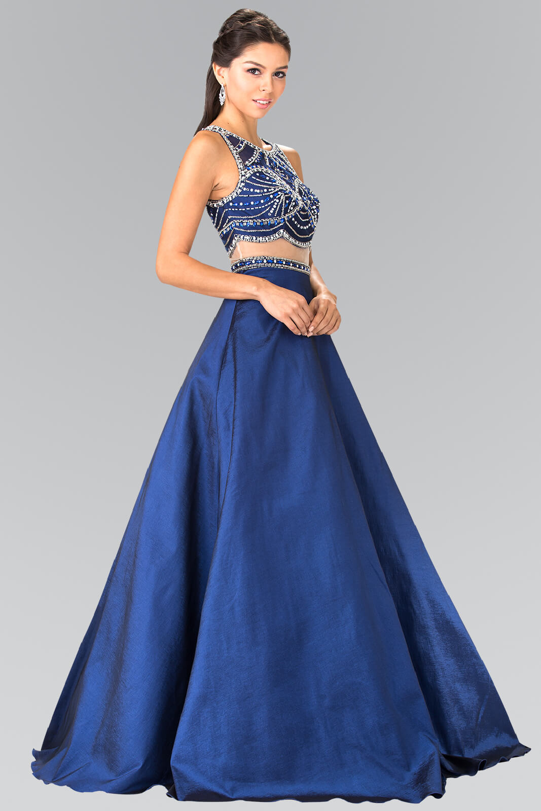 <p> </p> <p>This gorgeous mock two piece dress features a boat neck and a taffeta princess skirt. Beads embellish the bodice and belt. Zipper closure in back. This dress is perfect for prom party or any special occasion.</p> <p> </p> <p>Fabric : Taffeta</p> <p>Closure : Back Zipper</p> <p>Sleeve Style : Sleeveless</p> <p>Colors : Burgundy, Navy</p> <p>Sizes : XS, S, M, L, XL, 2XL</p> <p>Fully Lined</p> <p>Occasion : Formal, Prom, Homecoming, Special Occasion</p> 