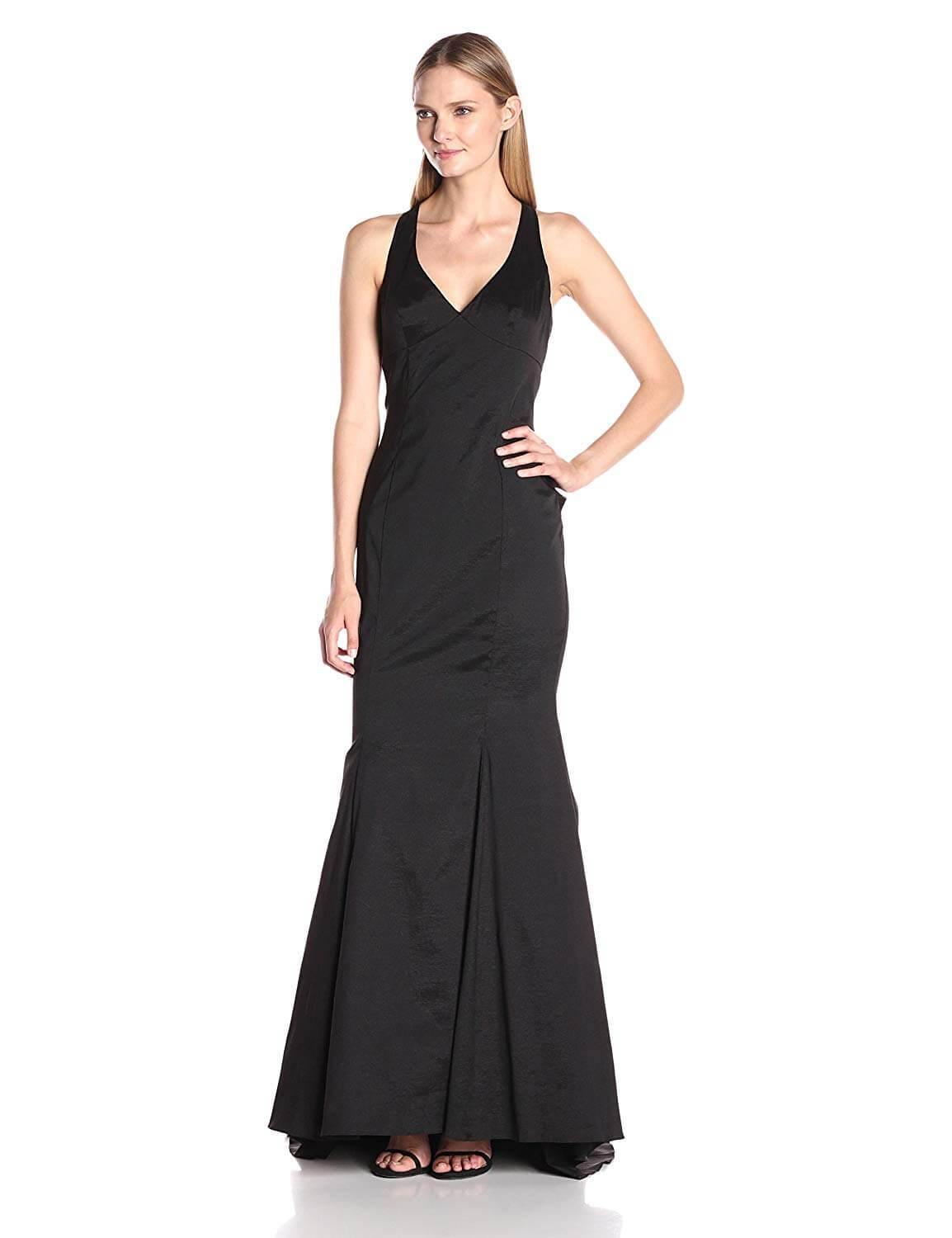 This stunning floor length dress efatures sleeveless V-neckline and form fitting bodice. The back has a zipper closure which connects to the long trail of ruffle details to the sweep train at the back of the trumpet skirt. Perfect for formal, evening party or any special occasion.<br><br><br>Fabric : Taffeta<br><br>Closure : Zipper Back<br><br>Length : Full Length<br><br>Sleeve Style : Sleeveless<br><br>Color : Black<br><br>Sizes : 2, 4, 10, 12, 14<br><br>Fully Lined<br><br>Soft Cup Inserts<br><br>Occasion : Formal, homecoming, Evening Party, Church, Wedding Guest, Dinner Party, Special Occasion