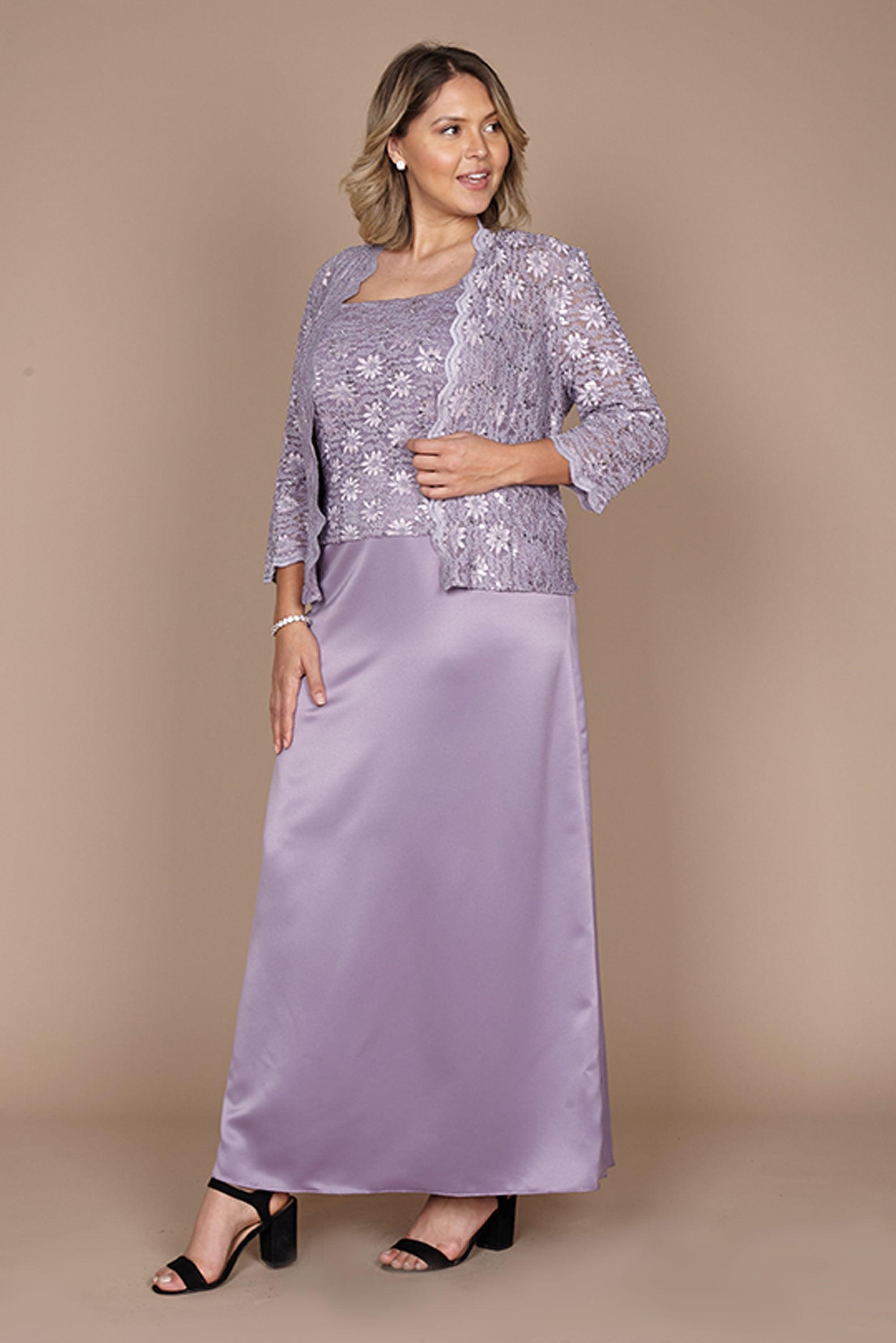 A two-piece set mother of the bride long dress features a sleeveless tank top bodice in weaved trim with a coordinating with scallop edged sheer ribbon coat with thin three-quarter length sleeves. Perfect for any special occasion.<br data-mce-fragment="1"><br data-mce-fragment="1"><br data-mce-fragment="1">Fabric : Lace, Chiffon<br data-mce-fragment="1"><br data-mce-fragment="1">Zipper Back<br data-mce-fragment="1"><br data-mce-fragment="1">Length : Full Length<br data-mce-fragment="1"><br data-mce-fragment="1">Sleeve Style : Sleeveless<br data-mce-fragment="1"><br data-mce-fragment="1">Colors : Eggplant, Icy Orchid<br data-mce-fragment="1"><br data-mce-fragment="1">Sizes : 14W, 16W, 18W, 20W, 22W, 24W<br data-mce-fragment="1"><br data-mce-fragment="1">Fully Lined<br data-mce-fragment="1"><br data-mce-fragment="1">Soft Cup Inserts<br data-mce-fragment="1"><br data-mce-fragment="1">Occasion : Formal, Mother of the Bride, Mother of the Groom, Church, Wedding Guests