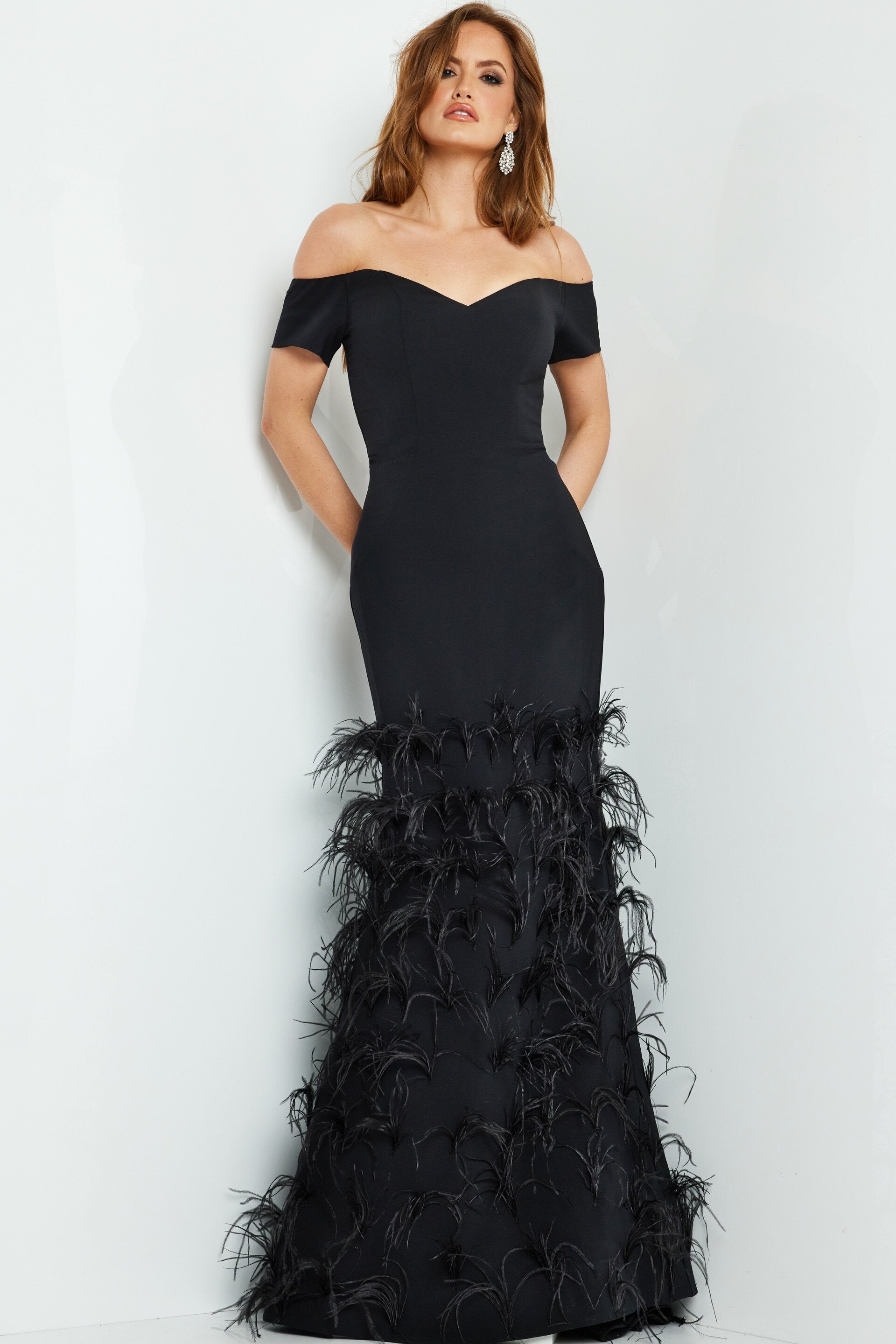 <li>
<strong>Collection:</strong> Mother of the Bride, Black Tie</li><li>
<strong>Material:</strong> Crepe</li><li>
<strong>Style: </strong>Fitted, slightly flare bottom</li><li>
<strong>Details:</strong> Feather skirt</li><li>
<strong>Length:</strong> Floor length</li><li>
<strong>Back Style: </strong>Straight</li><li>
<strong>Necklines: </strong>Sweetheart, off the shoulder</li><li>
<strong>Sleeve Type:</strong> Short </li><li>
<strong>Color:</strong> Black, Ivory, Pum, hunter</li><li>
<strong>Care Instructions: </strong>Spot Dry Clean Only</li><li>
<strong>Available Sizes: </strong>00-24</li><li>Jovani 08384</li>