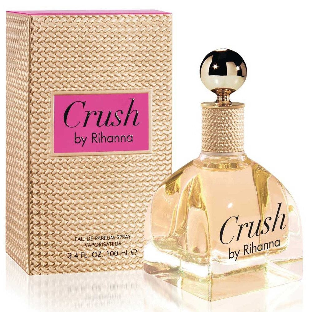 Crush by Rihanna comes out in the summer of 2016. The new fragrance is Rihanna's eighth, and judging by the design of the bottle, it belongs to the same collection as RiRi by Rihanna from 2015. Crush is announced as a mysterious, sexy and provocative scent that breaks down barriers and is setting new rules; strong, empowering, unapologetic and confident. <br>The composition is said to be floriental. Fresh notes of bergamot, juicy mandarin and bright pink pepper create the opening and lead to the floral - fruity heart. Pink rose blends with spicy ylang-ylang, complemented by sweet and sour red berries aroma. The base ends with woody notes of sexy patchouli, creamy musk and cedar. The perfume was developed by Natasha Cote.<br>The bottle was designed by Rihanna herself; the form is identical to the RiRi edition, colored in shades of gold and decorated with pink details. It is available from the beginning of August 2016 as a 30 and 100 ml Eau de Parfum, along with a 10 ml rollerball. 