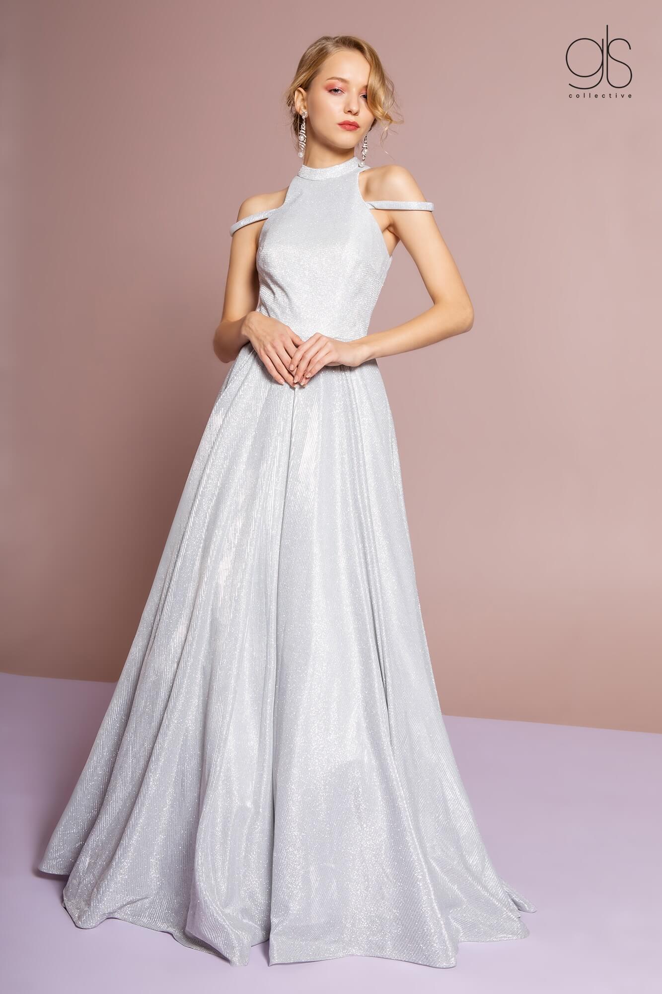 This stunning floor length high neck dress features halter neck with cut-away shoulder and made of glitter crepe. Perfect for evening party, formal or any special occasion.<br><br> <br>Fabric : Lace<br><br>Closure : Zipper Back<br><br>Length : Full Length<br><br>Sleeve : Halter<br><br>Color : Silver<br><br>Sizes : XS, S, M, L, XL, 2XL, 3XL<br><br>Fully Lined<br><br>Soft Cup Inserts<br><br>Occasion : Formal, Prom, Homecoming, Wedding Guest, Evening Party, Red Carpet, Pageant, Special Occasion 