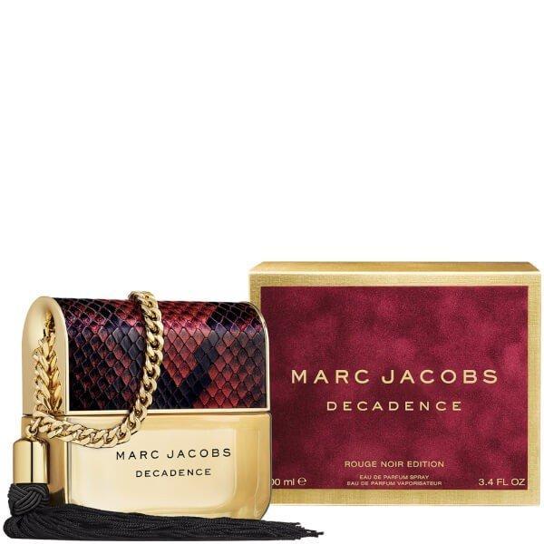 Marc Jacobs Decadence Rouge Noir by Marc Jacobs Perfume. Step out on a Friday night in style looking ever so chic and classy with Marc Jacobs Decadence Rouge Noir, a luscious women's fragrance. This mysterious perfume boasts a sexy combination of floral, fruity, spicy and powdery accords for a grand elixir that's sure to enhance your favorite little black dress. Top notes of saffron flower, iris and plum create an immediately stunning combination with their sweet, sultry edge. Notes of jasmine Sambac, orris and rose at the heart further stimulate the mind and body with their feminine mystique. Finally, base notes of papyrus, amber and vetiver finish off the aroma with a soft, herbal remedy that makes the fragrance warm and breezy. Overall, this enigmatic perfume is elusive and tantalizing, bound to attract anyone nearby when you enter the club.