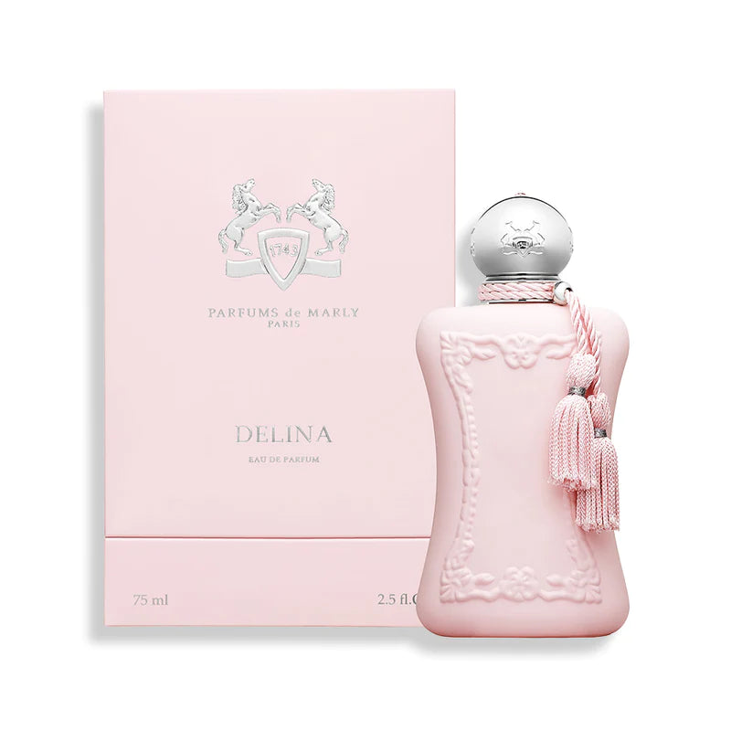<p><span>LIMIT 1 PER CUSTOMER</span></p>
<p>Pretty, pink and purely feminine, Delina Eau de Parfum will warm your heart and make you feel like royalty.<br>Fragrance story: A floral explosion of Turkish rose, lily of the valley and peony creates a girlish, feminine fragrance accented with bright and tangy notes of lychee, rhubarb and bergamot. Vanilla, musk and cashmeran will wrap you in a feeling of warmth and sensuality.<br><br>Style: Floral.<br><meta charset="utf-8">Mood: Feminine, delicate, sensual.<br>Notes: Top: bergamot, nutmeg, rhubarb, lychee. Middle: Turkish rose, vetiver, incense, cedarwood. Base: vanilla, cashmeran, musk.<br><br></p>