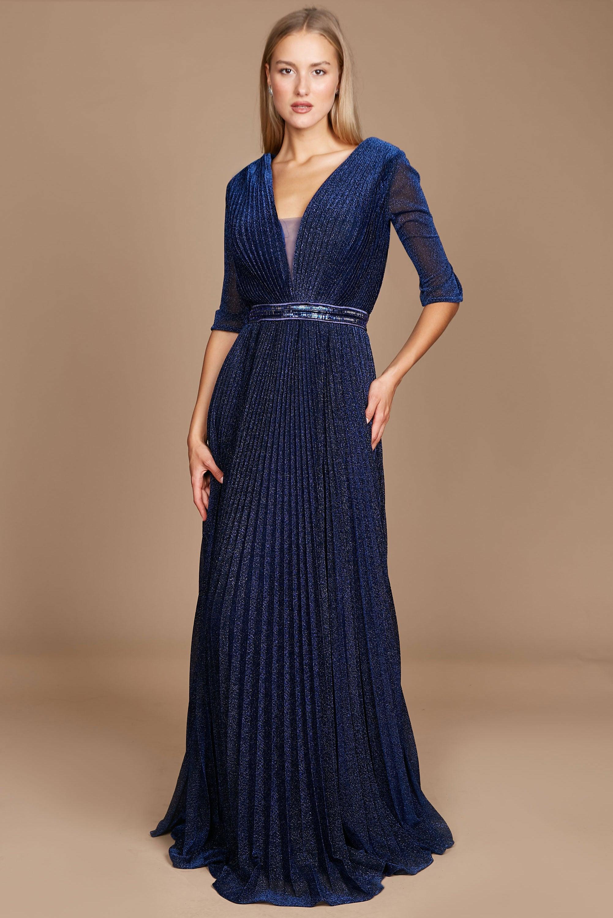 <p> </p> <p class="root-block-node" data-changed="false" data-paragraphid="18"><span data-mce-fragment="1">This Dylan &amp; Davids Mother of the Bride Dress from The Dress Outlet combines elegance with a modern touch. Featuring a multi-layered A-line silhouette dress, <span class="red-underline" data-startindex="168" data-endindex="182" data-paragraphid="18" data-mce-fragment="1">quarter sleeves</span> framing a flattering V-neckline. Its delicate design and variety of colors create that classy look, while the soft fabric and easy fit promise an effortless look that works well for all occasions. </span></p> <p class="root-block-node" data-changed="false" data-paragraphid="18"> </p> <p>Length : Full Length</p> <p>Sleeve Style : 3/4 Sleeve</p> <p>Color : Navy, Black, Rose Gold</p> <p>Sizes : M, L, XL, 2XL, 3XL, 4XL, 5XL, 6XL</p> <p>Fully Lined</p> <p>Occasion : Formal, Prom, Homecoming, Wedding Guest, Red Carpet, Pageant, Evening Party</p>