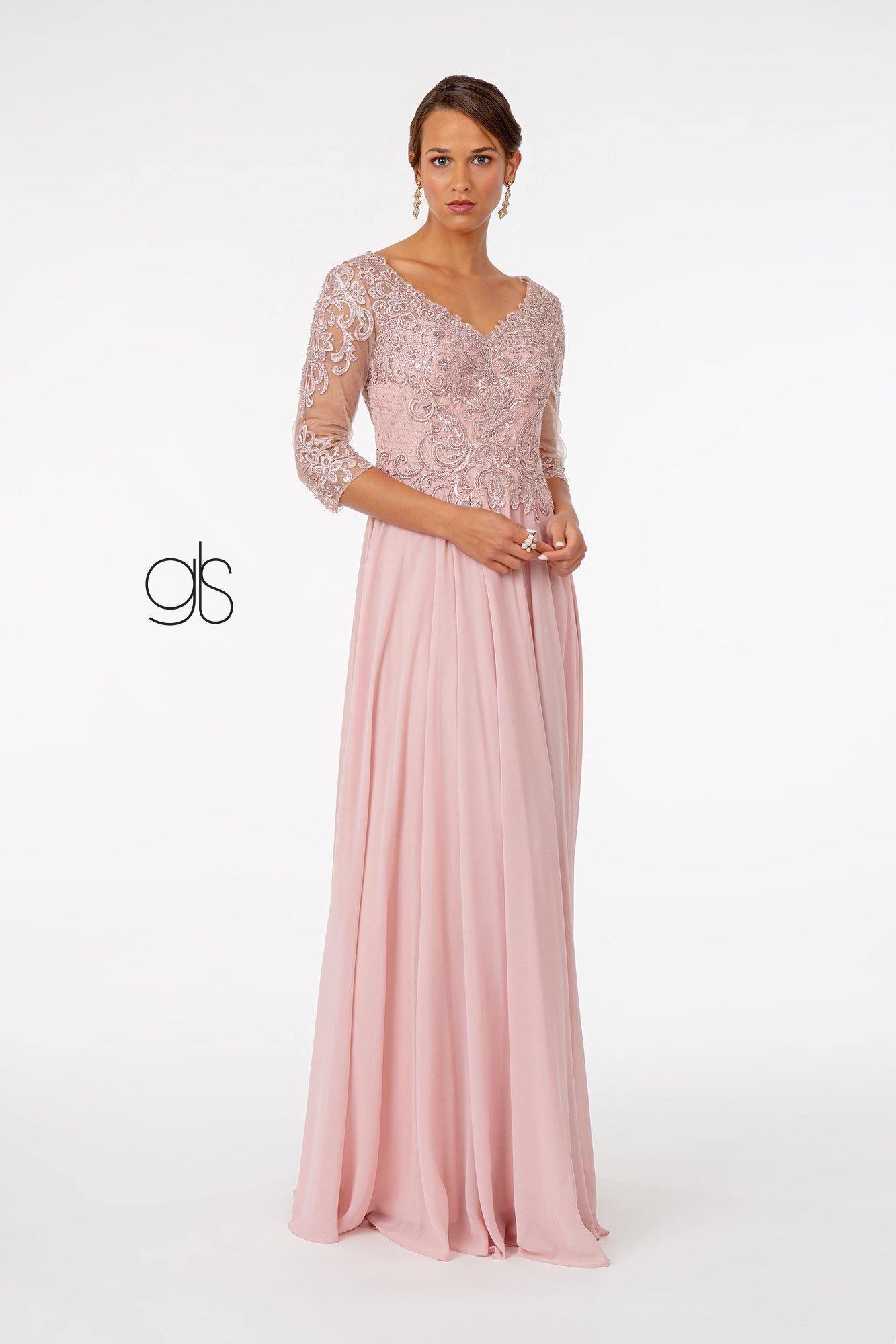 <p> </p> <p>This elegant long prom dress features a sleeveless V-neckline. Floor length A-line gown with eembroidered bodice. This dress is perfect for any special occasion.<br></p> <p><br></p> <p>Fabric : Chiffon</p> <p>Length : Floor Length</p> <p>Sleeve Style : 3/4 Sleeve</p> <p>Colors : Champagne, Dusty Rose</p> <p>Sizes : S, M, L, XL, 2XL, 3XL, 4XL, 5XL</p> <p>Fully Line</p> <p>Soft Cup Inserts</p> <p>Occasion : Formal, Prom, Homecoming, Evening Party</p>