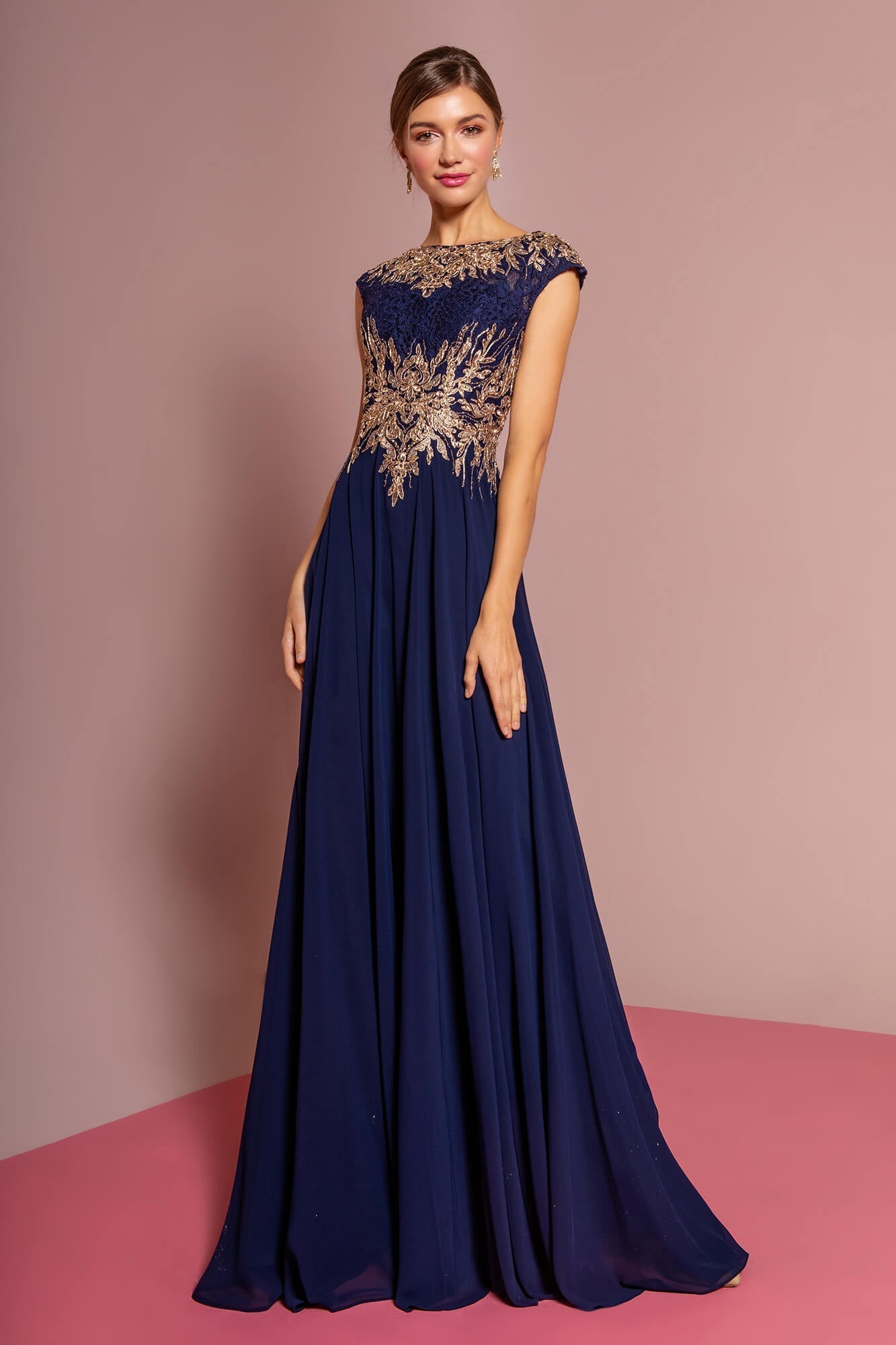 <p><br><span>This formal dress is a classic, simple design that you’ll want to wear again and again. This dress has a bateau neckline with cap sleeves. The fitted bodice is ornate with lace embroidery and has a back zipper closure. The chiffon skirt flourishes a full length A-line skirt.  Available in a variety of colors and sizes, ranging from S to 4XL. Perfect for weddings, parties, or other formal occasions.</span></p> <p> </p> <p>Fabric : Chiffon, Lace<br><br>Closure : Back Zipper<br><br>Sleeve Style : Cap Sleeve<br><br>Colors : Navy, Burgundy, Mauve, Teal<br><br>Sizes : S, M, L, XL, 2XL, 3XL, 4XL<br><br>Fully Lined<br><br>Occasion : Formal, Prom, Homecoming, Special Occasion</p>