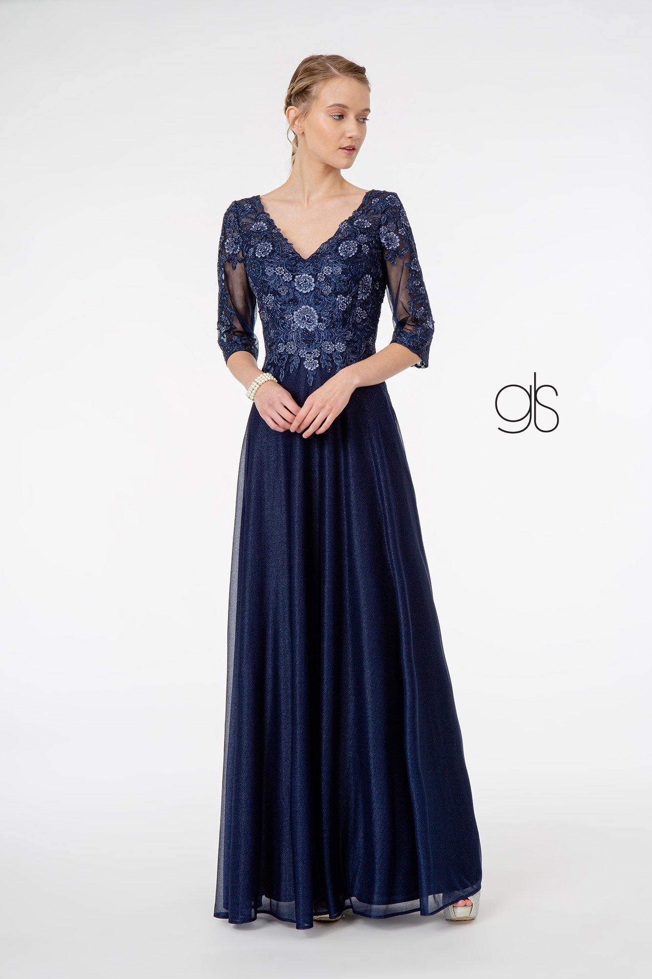 <p> </p> <p>This elegant long formal dress features a 3/4 sleeve V-neckline. Floor length A-line gown with embroidered bodice. This dress is perfect for any special occasion.<br></p> <p><br></p> <p>Fabric : Chiffon</p> <p>Closure : Back Zipper</p> <p>Length : Floor Length</p> <p>Sleeve Style : 3/4 Sleeve</p> <p>Colors : Navy, Silver</p> <p>Sizes : S, M, L, XL, 2XL, 3XL, 4XL</p> <p>Fully Line</p> <p>Soft Cup Inserts</p> <p>Occasion : Formal, Prom, Homecoming, Evening Party</p>