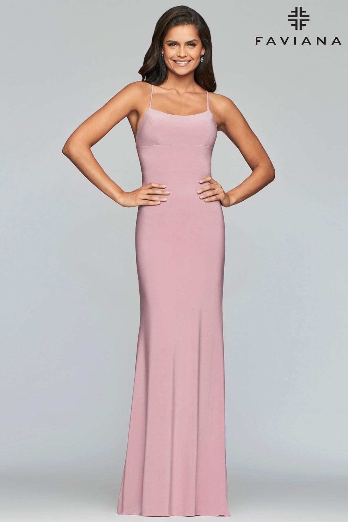 <p> </p> <p>Wear this <span data-mce-fragment="1">simple jersey fitted prom dress with lace up back and scoop neckline. </span><span style="font-weight: 400;">This dress also features the perfect gown silhouette and is made of luxurious, soft fabric that accentuates your natural curves.</span></p> <p> </p> <p>Fabric : Jersey</p> <p>Corset, Zipper Back</p> <p>Length : Full Length</p> <p>Sleeve Style : Spaghetti Strap</p> <p>Colors : Mauve, Black, Red</p> <p>Sizes : 00, 0, 2, 4, 6, 8, 10, 12, 14</p> <p>Fully Lined</p> <p>Occasion : Formal, Evening Party, Bridesmaid, Homecoming, Wedding Guest, Red Carpet, Pageant</p>