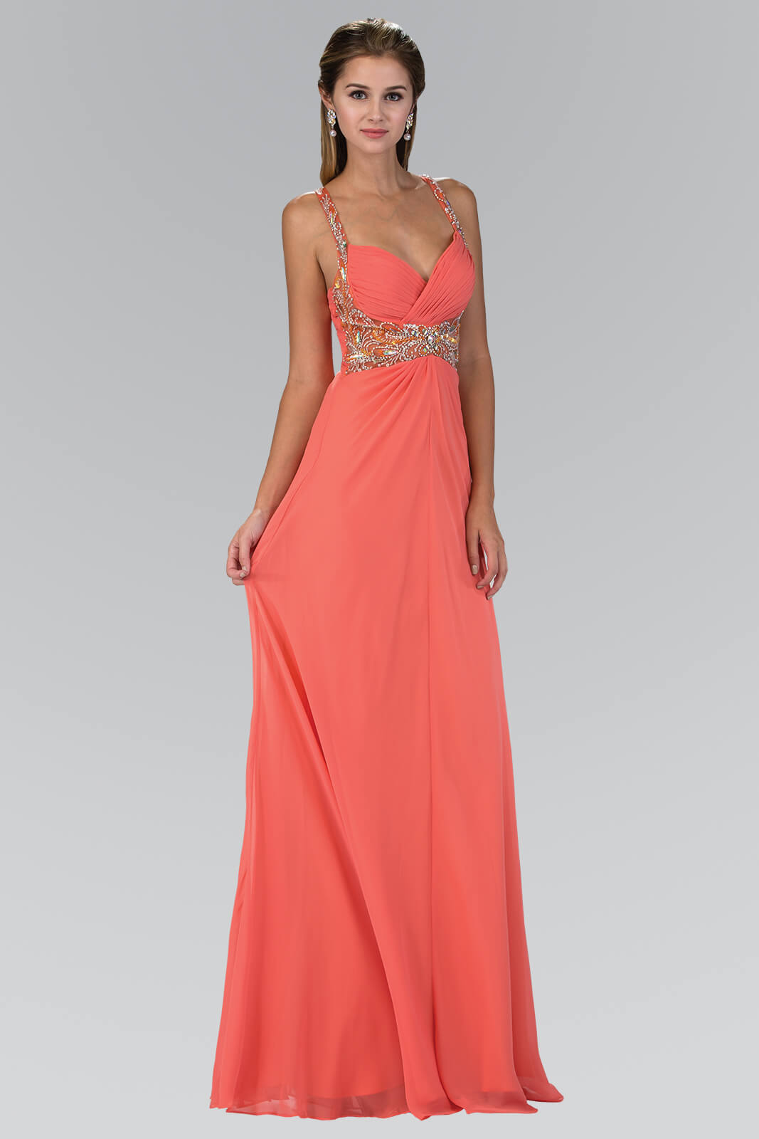 <p><br><span>Shows off a sleeveless, sweetheart neckline with jewel accents styled on the straps and empire waistband. The bust features ruched details and begins its flowy Chiffon A-line skirt. </span></p> <p> </p> <p>Fabric : Chiffon<br><br>Closure : Back Zipper<br><br>Sleeve Style : Sleeveless<br><br>Color : Coral<br><br>Sizes : XS, S, M, L, XL<br><br>Fully Lined<br><br>Occasion : Formal, Prom, Homecoming, Special Occasion</p> 