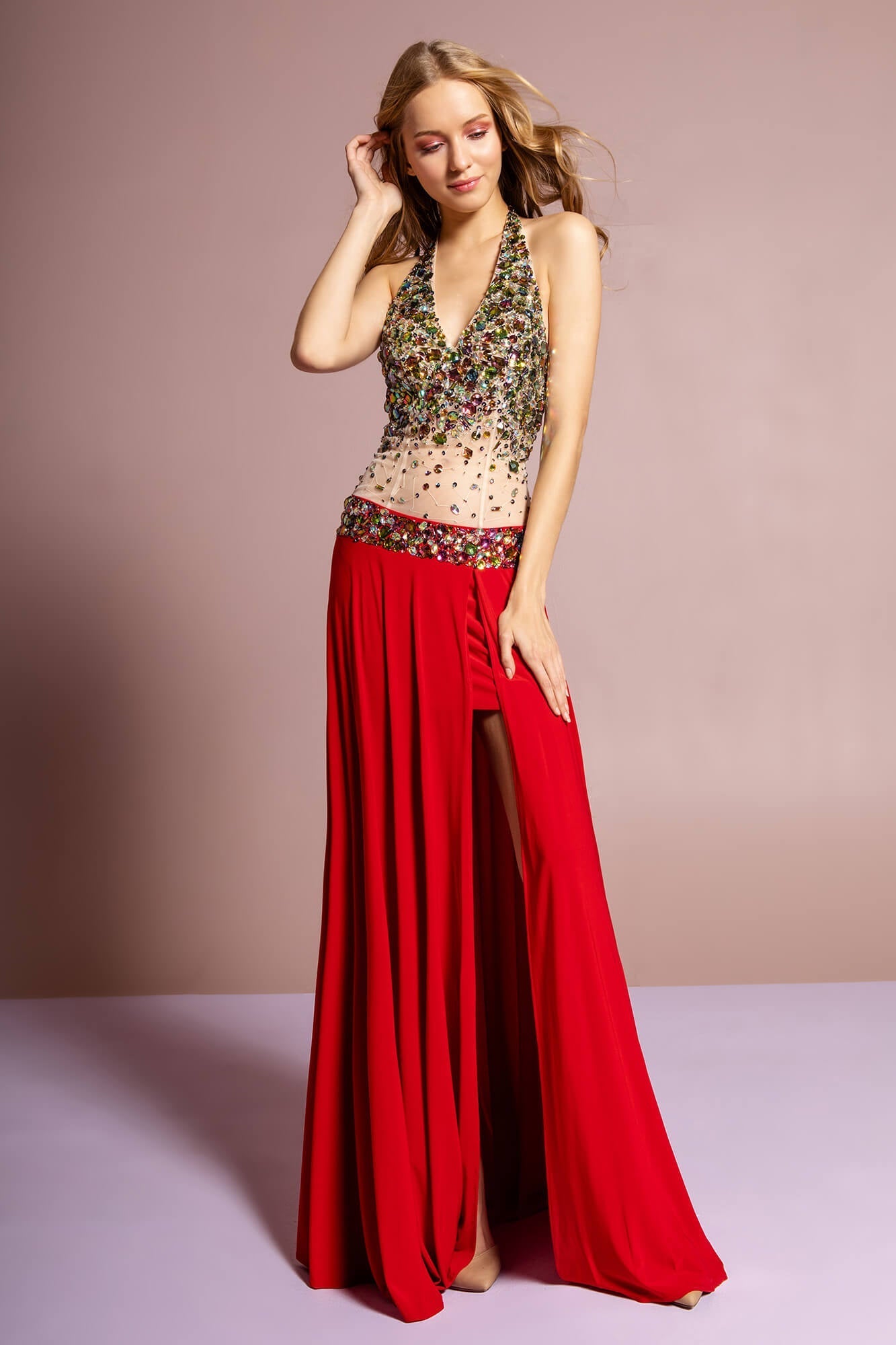 This long dress features a halter neckline with jewel ornate embellished in the fitted bodice and sheer midriff. The skirt flourishes towards the floor in a trumpet silhouette with side slit. Perfect for formal, evening party or any special occasion.<br><br><br>Fabric : Jersey<br><br>Closure : Zipper Back<br><br>Length : Full Length<br><br>Sleeve Style : Halter<br><br>Colors : Red, Black<br><br>Sizes : XS, S, M, L, XL, 2XL<br><br>Fully Lined<br><br>Occasion : Formal, Prom, Homecoming, Wedding Guest, Evening Party, Red Carpet, Pageant, Special Occasion 