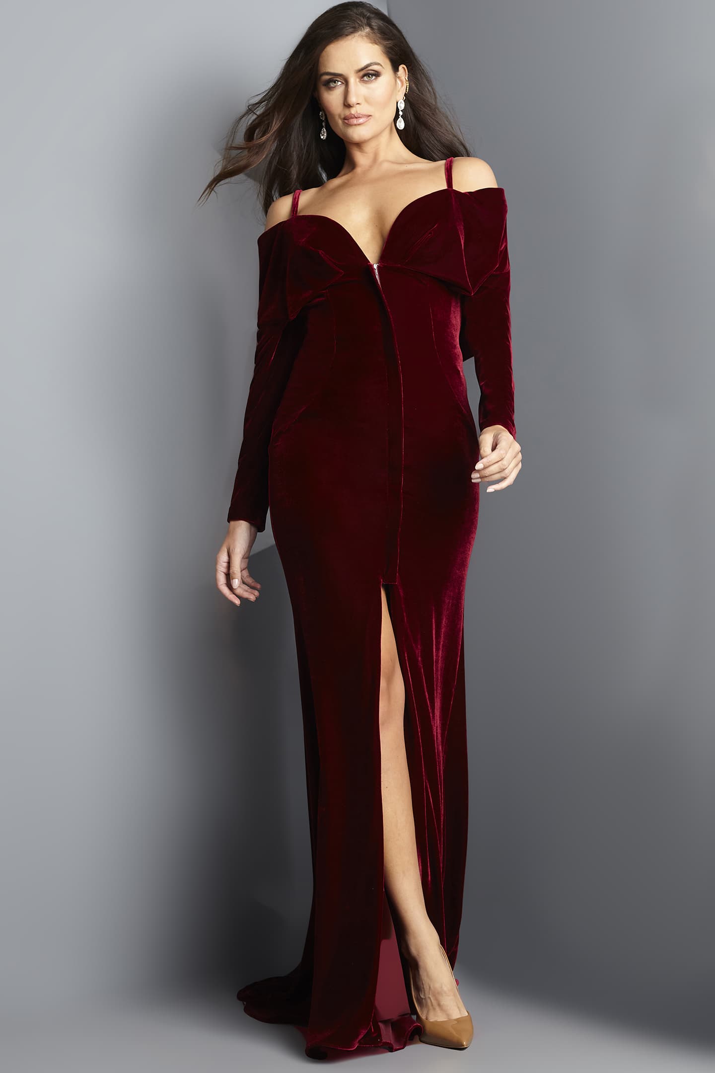 <li>
<strong>Collection:</strong> Formal Dresses, Plus Size, Black Tie</li><li>
<strong>Material:</strong> Velvet</li><li>
<strong>Style: </strong>Column, Fitted</li><li>
<strong>Details:</strong> Train, Front Zippe</li><li>
<strong>Length:</strong> Long Dresses</li><li>
<strong>Back Style: </strong>Closed Back with Ruffled </li><li>
<strong>Necklines: </strong>Sweetheart</li><li>
<strong>Sleeve Type:</strong> Long, Cape</li><li>
<strong>Color:</strong> Black, Burgundy</li>