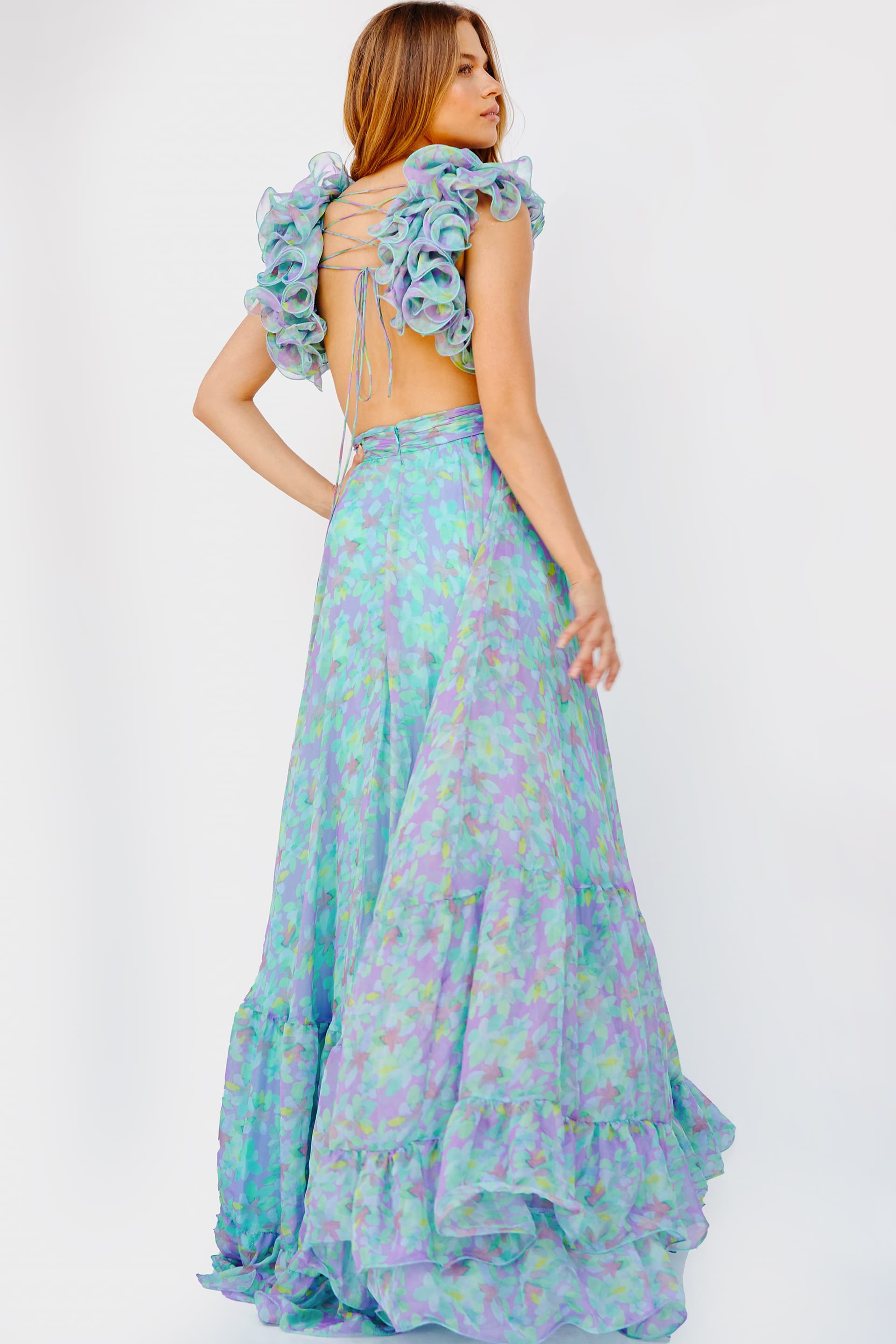 <li>
<strong>Closure: </strong>Invisible Back Zipper with Hook and Eye Closure</li><li>
<strong>Details:</strong> Floral print chiffon gown, high-waisted long flowy skirt with ruffle bottom, ruched bodice with criss cross waist and open back, v-neck and ruffle straps over shouIders, tie back.</li><li>
<strong>Available colors: </strong>print</li><li>
<strong>Fabric: </strong>Chiffon</li><li>
<strong>Fit: </strong>The Model is 5'9  and Wearing 3  Heels. </li><li>
<strong>Neckline: </strong>V</li><li>
<strong>Waistline</strong>: High</li><li>
<strong>Style: </strong>Jovani 23320</li><li>
<strong>Cleaning:</strong> Spot dry clean only</li><li>
<strong>Sizes:</strong> Plus sizes available</li><li>
<strong>Material:</strong> Tulle</li><li>
<strong>Style: </strong>A-Line, Print</li><li>
<strong>Details:</strong> Ruffles</li><li>
<strong>Length:</strong> Long Dress</li><li>
<strong>Back Style: </strong>Zipper, Corset Lace Up</li><li>
<strong>Necklines: </strong>V-Neck</li><li>
<strong>Sleeve Type:</strong> Sleeveless</li>