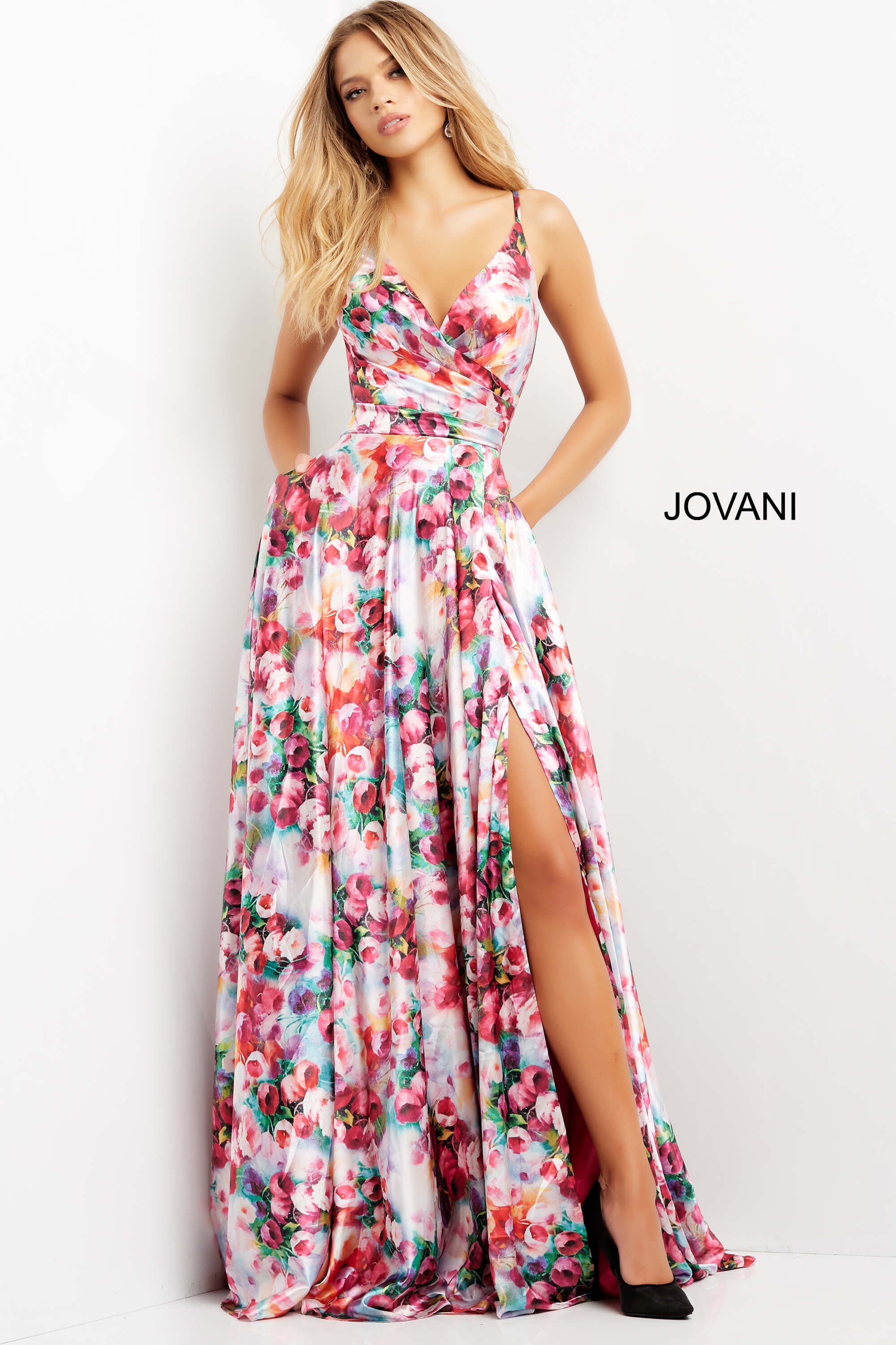 <li>
<strong>Closure: </strong>Invisible Back Zipper with Hook and Eye Closure, tie-back bodice.</li><li>
<strong>Details:</strong> Multi floral print maxi gown, flowy long skirt with a slit and side pockets, pleated bodice with V neck, spaghetti straps over shoulders and open lace up back.</li><li>
<strong>Fabric: </strong>100% Polyester, satin chiffon</li><li>
<strong>Fit: </strong>The Model is 5'9  and Wearing 3  Heels. </li><li>
<strong>Neckline:</strong> V</li><li>
<strong>Waistline</strong>: Natural</li><li>Jovani 09029</li><li>Spot dry clean only</li><li>Available sizes: 00-24</li><li>Plus size prom dress</li>