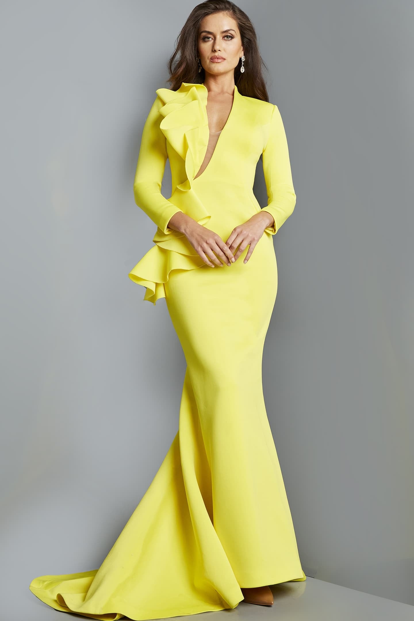 <li>
<strong>Occasion:</strong> Formal Dresses, Mother of the Bride</li><li>
<strong>Material:</strong> Scuba</li><li>
<strong>Style: </strong>Column, Fitted</li><li>
<strong>Details:</strong> Ruffles, Train, Drape</li><li>
<strong>Length:</strong> Long Dress</li><li>
<strong>Back Style: </strong>Closed Back with Zipper</li><li>
<strong>Necklines: </strong>V Neckline with Insert</li><li>
<strong>Sleeve Type:</strong> Long</li><li>
<strong>Collection:</strong> Black, Ivory, Navy, Red, Yellow</li>