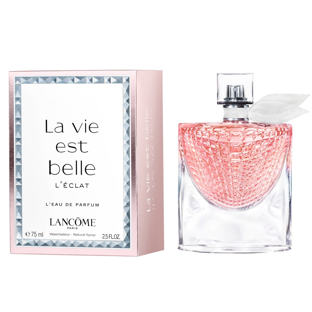 You see it in the sparkle of an eye, in the vibration of a smile. Something that the French call LÉclat. LÉclat is the fragrance of a luminous and never ending emotion, an invitation to share the light of happiness. A new olfactive of La vie est belle in a multi -faceted bottle that captures the light of happiness. This fragrance embodies the sparkle of the orange blossom, radiant fresh and sophisticated. For the woman who is looking for a fragrance that is fresher and lighter than La Vie est Belle Eau de Parfum, yet sensual and addictive. La vie est belle L'Éclat can be worn all day and layered with La Vie Est Belle classic ancillaries.