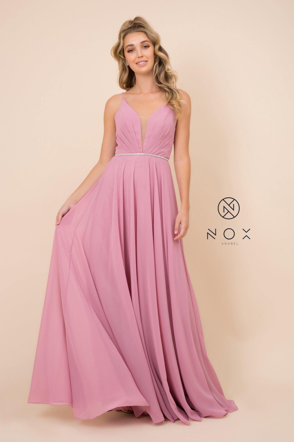 <p> </p> <p>This gorgeous long dress features a s<span>paghetti strap pleated gown with beaded waistband. Sleeveless deep V-neckline secured with an illusion inset panel. Floor length A-line skirt with strappy open corset back. This dress is perfect for any special occasion.</span></p> <p> </p> <p>Length : Floor Length</p> <p>Sleeve Style : Sleeveless</p> <p>Colors : Navy, Dusty Rose, Pale Turquoise, Gray</p> <p>Sizes : 4, 6, 8, 10, 12, 14, 16, 18, 20, 22</p> <p>Fully Line</p> <p>Soft Cup Inserts</p> <p>Occasion : Formal, Prom, Homecoming, Evening Party</p>