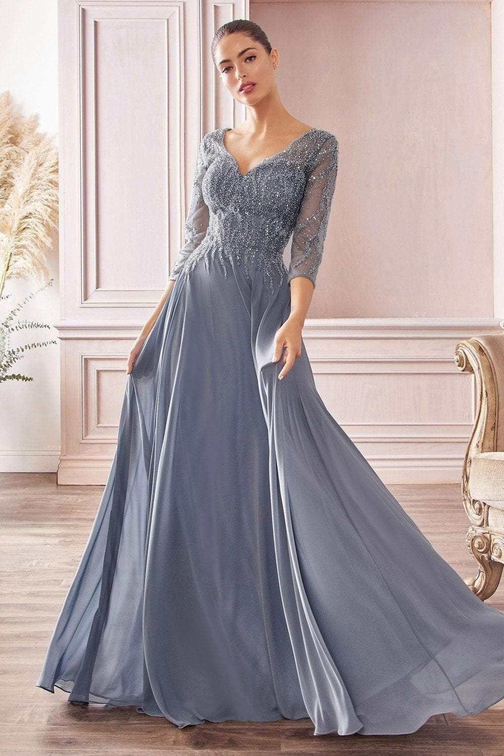 <p> </p> <p><span>This elegant floor-length dress is perfect for a wedding, evening party, or black tie event. Made from the finest materials, this Cinderella Divine CD0171 dress features a full A-line silhouette. The dress has a portrait V-neckline, sheer quarter-length sleeves, and a sweetheart-lined bodice with sparkly stone accents. The skirt has delicate gathers from the natural waist and flows gracefully down to the floor with a subtle sweep train. It comes in several colors and sizes from L to4X to fit your individual style and taste. </span></p> <p> </p> <p>Fabric : Chiffon</p> <p>Sleeve Style : 3/4 Sleeve</p> <p>Length : Full Length</p> <p>Colors : Dusty Rose, Mocha, Smoky Blue</p> <p>Sizes : L, XL, 2X, 3X, 4X</p> <p>Fully Lined</p> <p>Occasion : Formal Dresses, Prom Dresses, Homecoming Dresses</p> <p> </p>