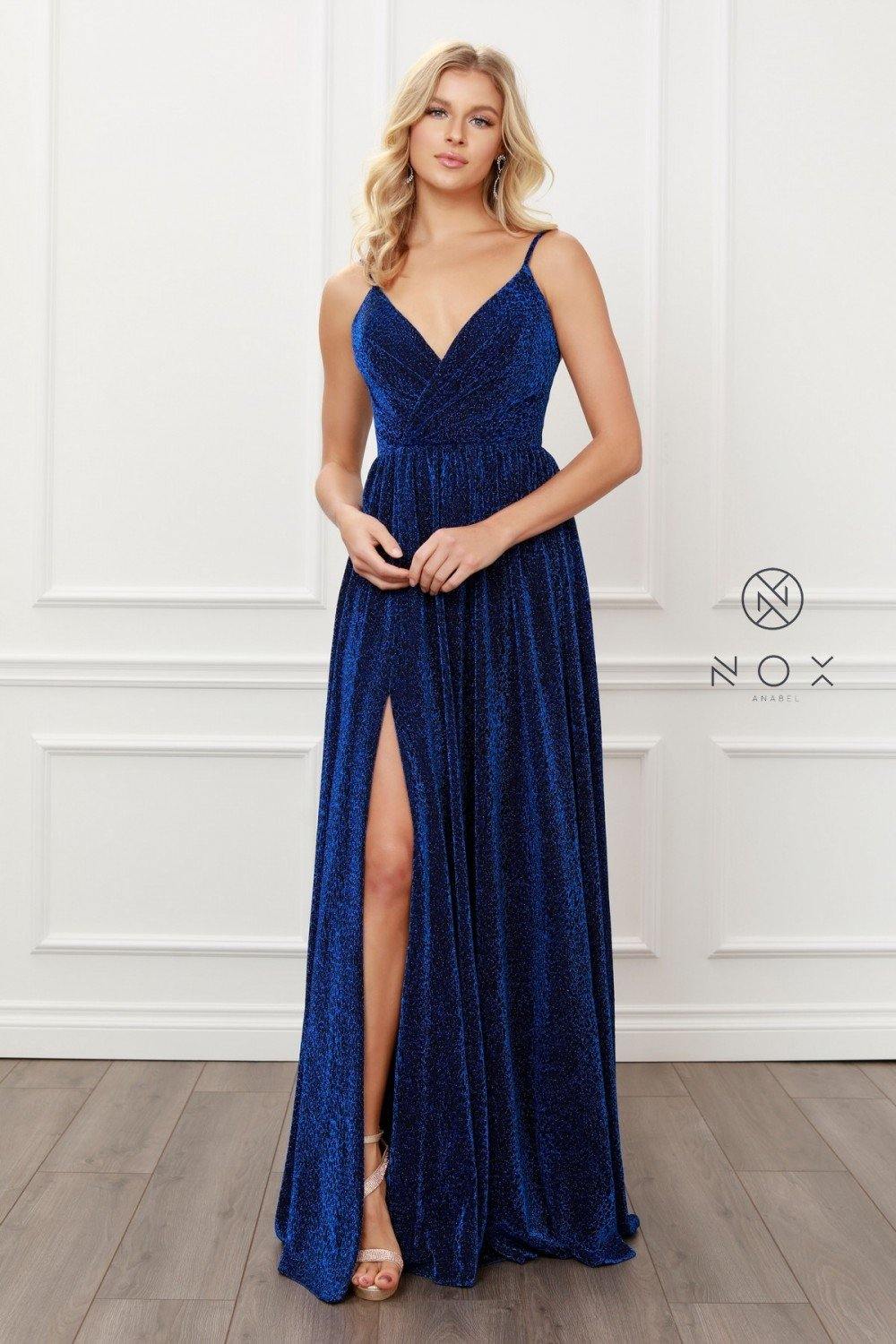 <p> </p> <p>This gorgeous long dress features a s<span>leeveless pleated V-neckline secured with spaghetti straps. Floor length A-line animal print skirt with side leg slit. This dress is perfect for any special occasion.</span></p> <p> </p> <p>Length : Floor Length</p> <p>Sleeve Style : Sleeveless</p> <p>Colors : <span class="Polaris-Badge_2qgie" data-mce-fragment="1">Black &amp; Royal, </span><span class="Polaris-Badge_2qgie" data-mce-fragment="1">Black &amp; Gold, </span><span class="Polaris-Badge_2qgie" data-mce-fragment="1">Black &amp; Magenta, </span><span class="Polaris-Badge_2qgie" data-mce-fragment="1">Black &amp; Burgundy</span></p> <p>Sizes : 4, 6, 8, 10, 12, 14</p> <p>Fully Line</p> <p>Soft Cup Inserts</p> <p>Occasion : Formal, Prom, Homecoming, Evening Party</p>