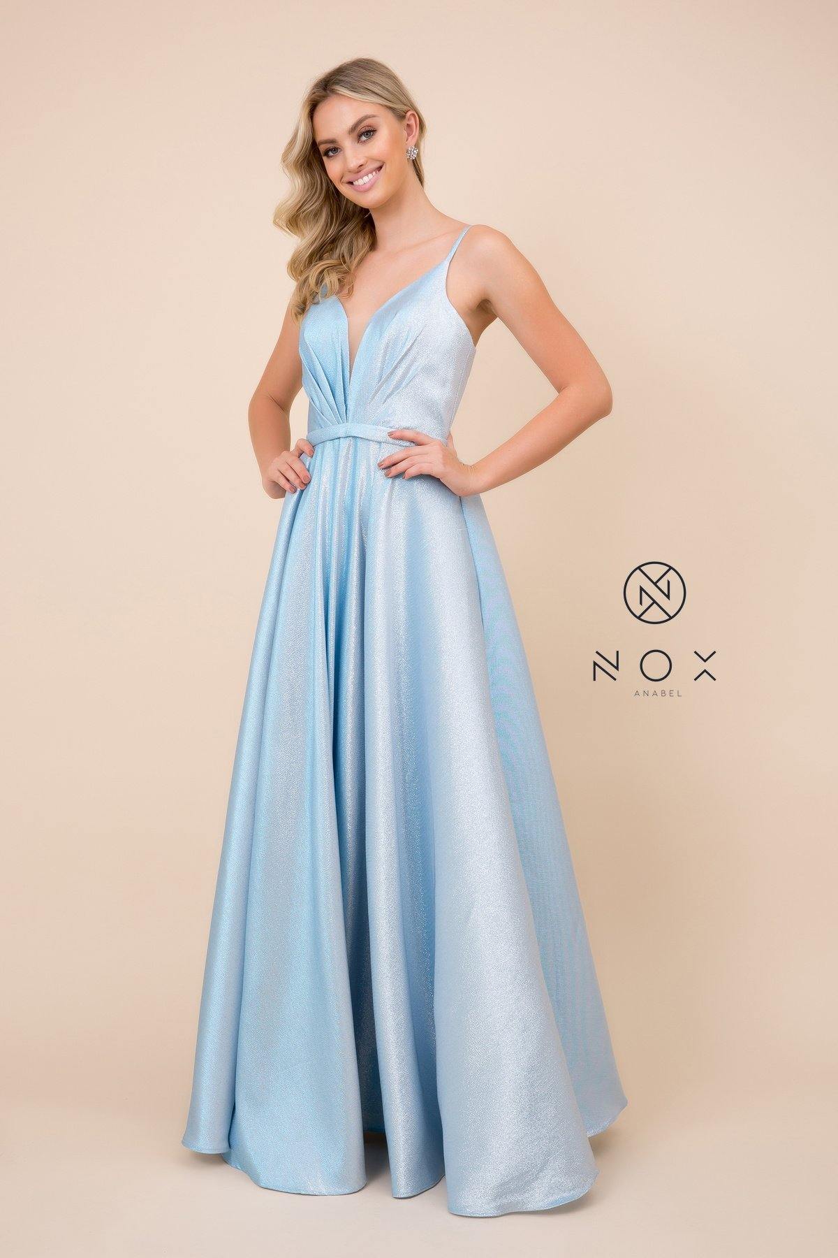 <p> </p> <p>This gorgeousl long dress features a s<span>leeveless illusion deep V-neckline secured with spaghetti straps. Floor length A-line box pleated skirt with open back and solid waistband.</span><span> </span><span>This dress is perfect for any special occasion.</span></p> <p><br></p> <p>Fabric : Metallic Glitter</p> <p>Closure : Back Zipper</p> <p>Length : Floor Length</p> <p>Sleeve Style : Sleeveless</p> <p>Colors : Peacock, Light Blue, Silver</p> <p>Sizes : 4, 6, 8, 10, 12, 14, 16</p> <p>Fully Line</p> <p>Soft Cup Inserts</p> <p>Occasion : Formal, Prom, Homecoming, Evening Party</p> 