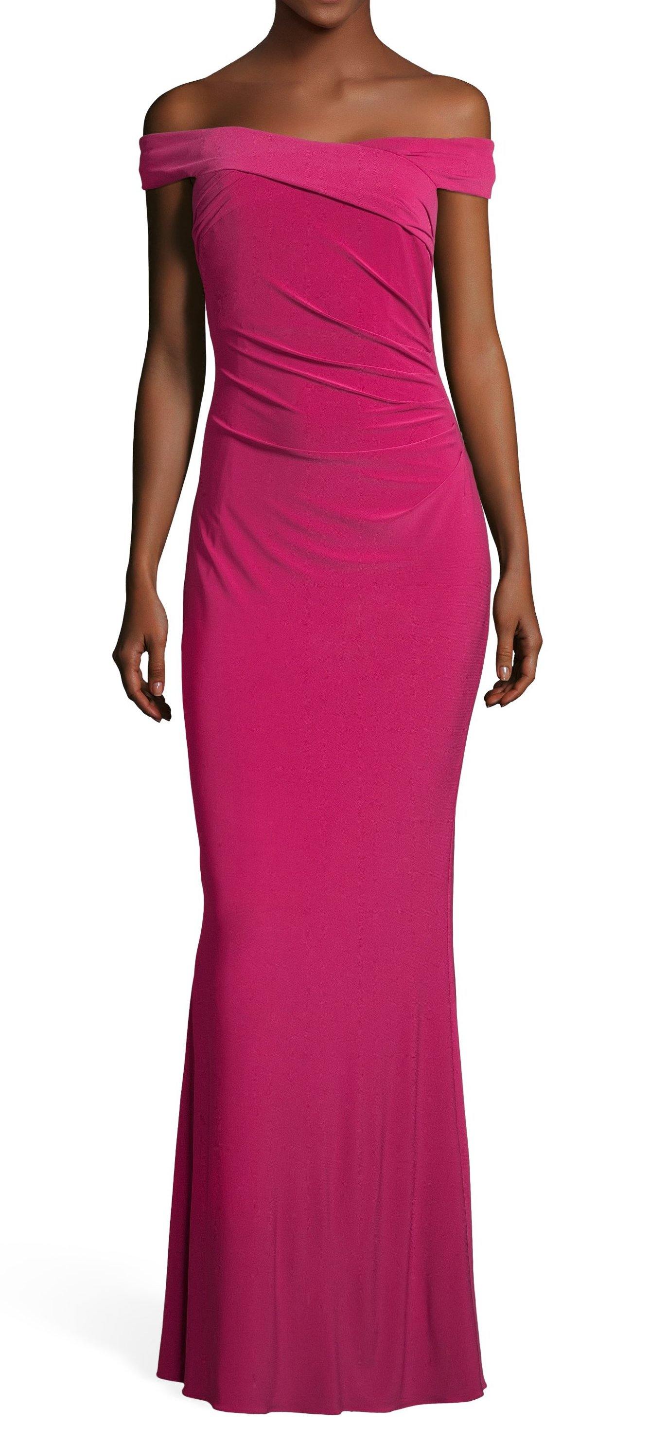 <p> </p> <p>This elegant long dress features a <span>boat neckline with pleated details, three quarter bell sleeves, and embroidered trim at the waist and sheer trim at the sleeves. A slit skirt allows for comfortable movement in this textured crepe dress. A zipper closure can be found at the back. </span><span>This dress is perfect for any special occasion.</span></p> <p> </p> <p>Sleeve Style : Off Shoulder</p> <p>Closure : Zipper Back</p> <p>Length : Full Length</p> <p>Color : <span>Bright Syrah</span></p> <p>Sizes : 14W, 16W, 18W, 20W, 22W, 24W</p> <p>Fully Lined</p> <p>Soft Cup Inserts</p> <p>Occasion : Evening Dress</p>