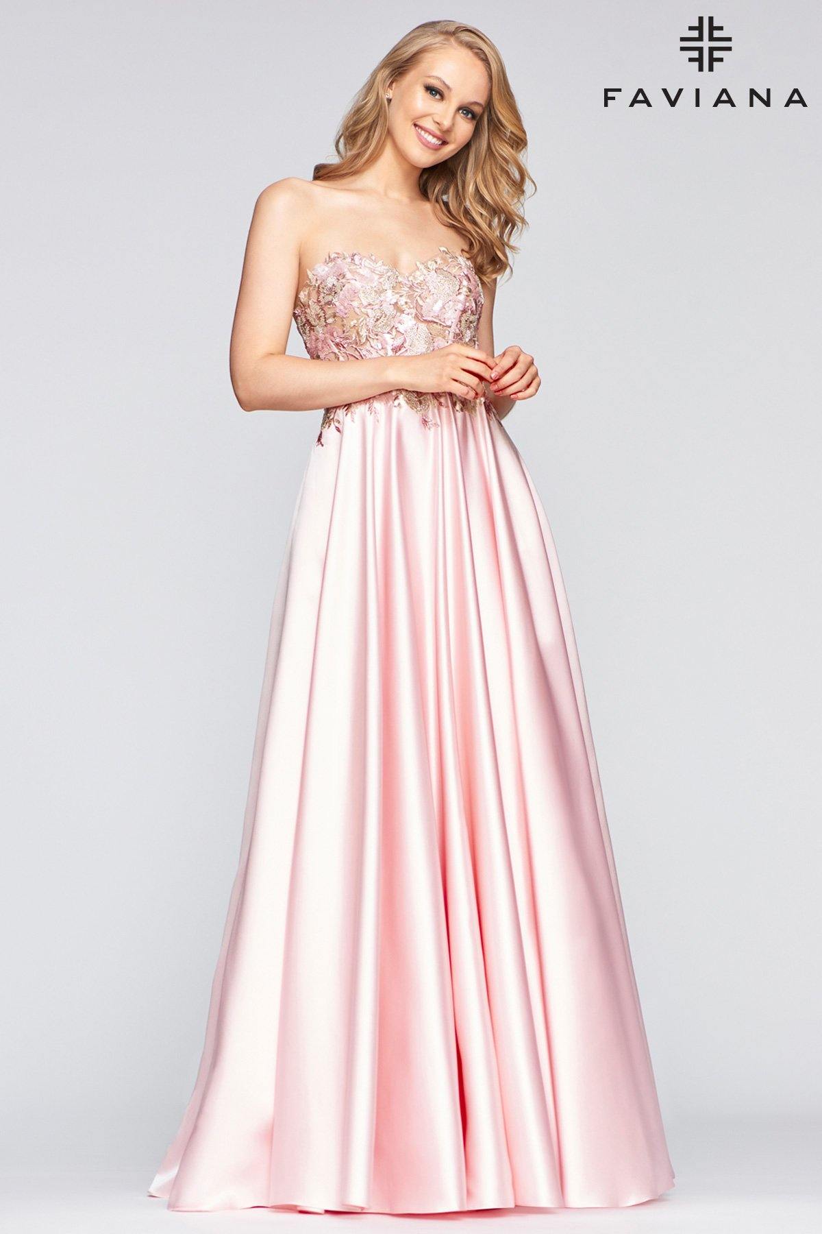 Stunning floor length dress features a strapless with sweetheart neckline. The bodice is decorated with lace appliques. A-line silhouette skirt with pockets. Perfect for any occasion. <br><br><br>Fabric : Satin<br><br>Closure : Corset, Zipper Back<br><br>Length : Full Length<br><br>Sleeve Style : Strapless<br><br>Color : Pale Pink<br><br>Sizes : 00, 0, 2, 4, 6, 8, 10, 12, 14, 16<br><br>Fully Lined<br><br>Soft Cup Inserts<br><br>Occasion : Formal, Prom, Homecoming, Wedding Guest, Evening Party, Red Carpet, Pageant, Special Occasion