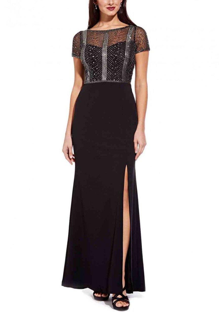  
<p>This elegant long dress features a<span> a sheer, beaded bodice which gives the dress a touch of elegance whilst the long black skirt is designed in a fitted structure to create that perfect silhouette. This dress is perfect for any special occasion.</span></p>
 
<p>Sleeve Style : Short Sleeve</p>
<p>Length : Floor Length</p>
<p>Color :<span> Black</span></p>
<p>Sizes : 2, 4, 6, 8, 10, 12, 14, 16</p>
<p>Fully Lined</p>
<p>Soft Cup Inserts</p>
<p>Occasion : Formal Dress</p>