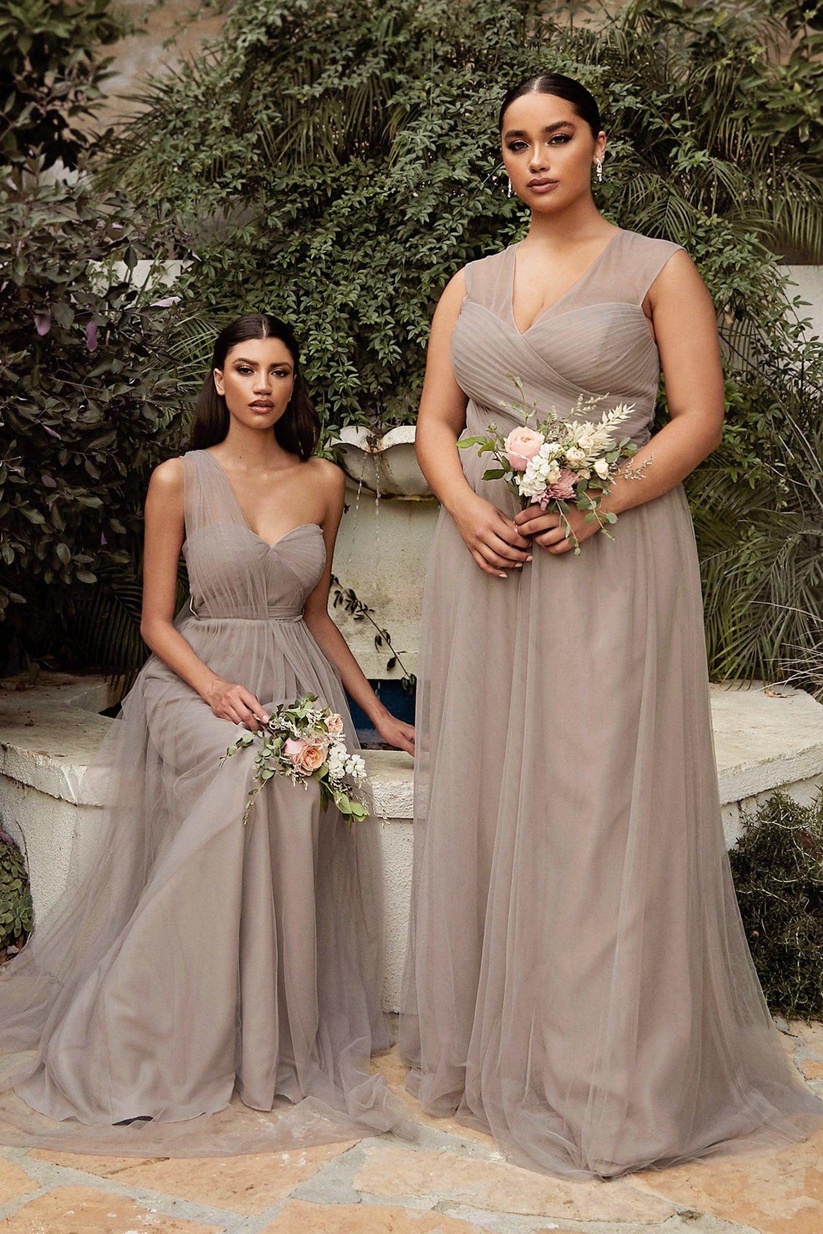 <p> </p> <p><span>This lovely Cinderella Divine ET322 dress is a statement of your bridesmaids' elegance, beauty, and character. The A-line silhouette will have you moving in style on the dance floor. The modern twist front bodice and convertible sleeve style will transform any event into a dream come true. Available in a variety of colors and styles, as well as sizes ranging from 4 to 18. The intricate detailing, beautiful fabrics, and comfortable fit of this dress make them feel like top priorities on such an important day!</span></p> <p> </p> <p>Length : Full Length</p> <p>Sleeve Style : Sleeveless</p> <p>Color : Mauve, Navy, Orchid, Paris Blue, Robin Blue, Sage, Sand, Teal</p> <p>Sizes : 4, 6, 8, 10, 12, 14, 16, 18</p> <p>Fully Lined</p> <p>Occasion : Formal, Prom, Homecoming</p> <p> </p>