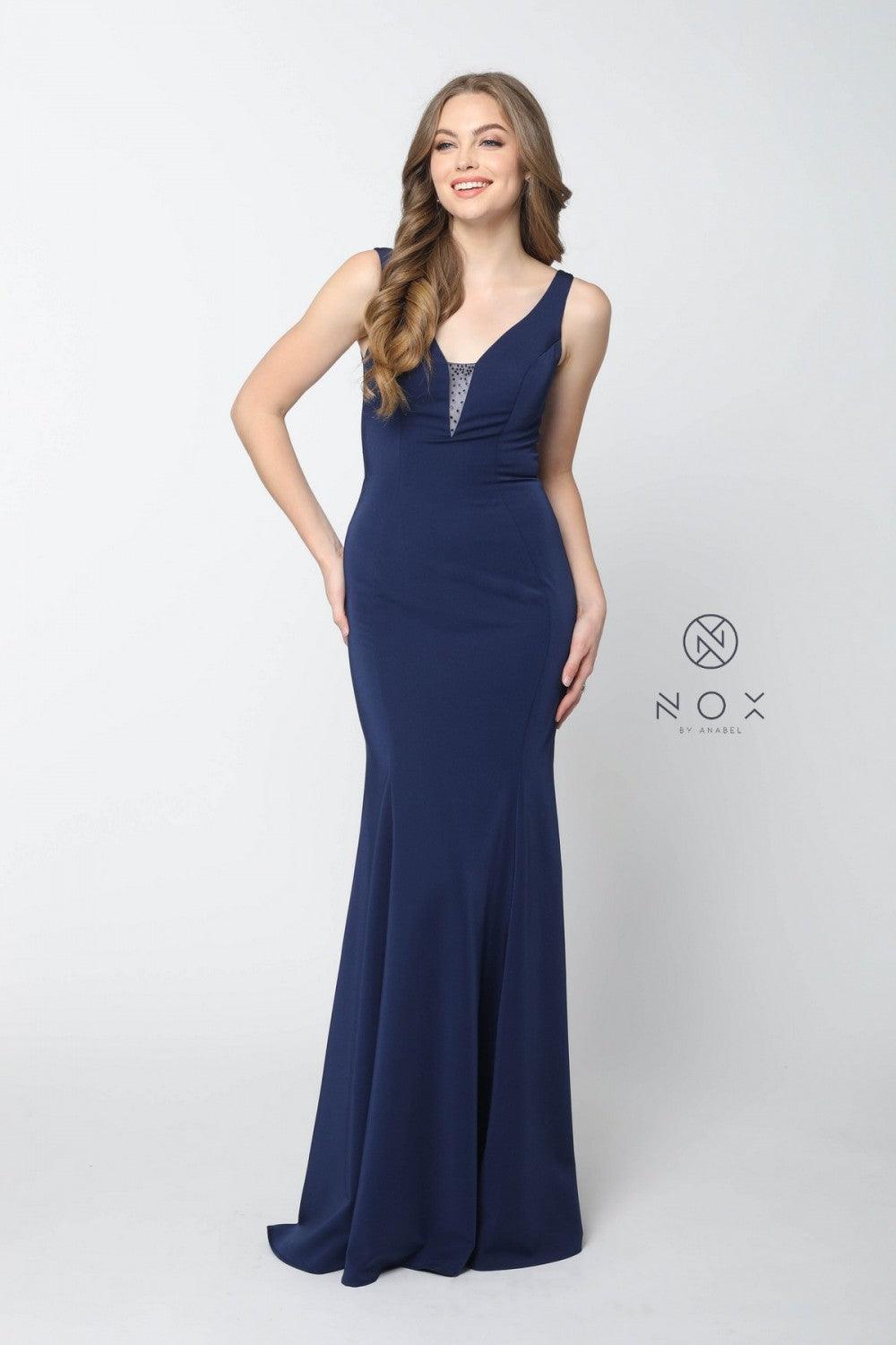 <p><br>This evening dress features a deep V-neck bodice anchored with a sheer panel accented with rhinestones, eye-catching open back with beaded sheer mesh, a full length A-line skirt that flares to the floor forming a small train, and a zipper closure.</p> <p> </p> <p>Closure : Back Zipper<br><br>Sleeve Style : Sleeveless<br><br>Length : Floor Length<br><br>Colors : Burgundy, Mauve, Navy Blue, Steel<br><br>Sizes : XS, S, M, L, XL, 2XL, 3XL<br><br>Fully Lined<br><br>Occasion : Formal, Prom, Homecoming, Special Occasion</p> 