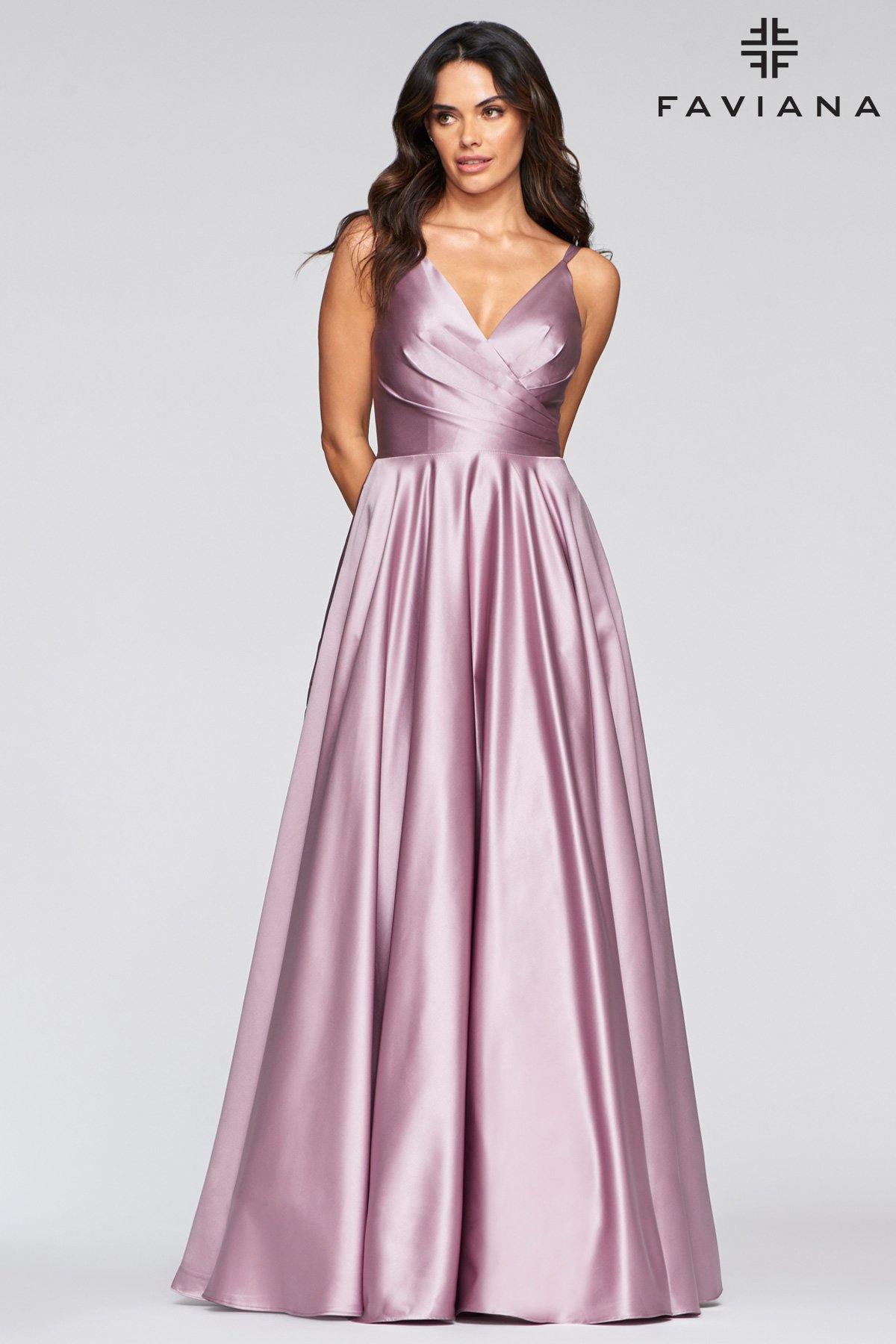 This stunning floor length dress features dual spaghetti straps deep v-neckline with pleated bodice. From the fitted waist fashions a full length A-line skirt that leads into a sweeping train with side pockets. Perfect for any occasion. <br><br><br>Fabric : Satin<br><br>Closure : Zipper Back<br><br>Length : Full Length<br><br>Sleeve Style : Spaghetti Strap<br><br>Color : Deep Mauve<br><br>Sizes : 00, 0, 2, 4, 6, 8, 10, 12, 14, 16<br><br>Fully Lined<br><br>Soft Cup Inserts<br><br>Occasion : Formal, Prom, Homecoming, Wedding Guest, Evening Party, Red Carpet, Pageant, Special Occasion