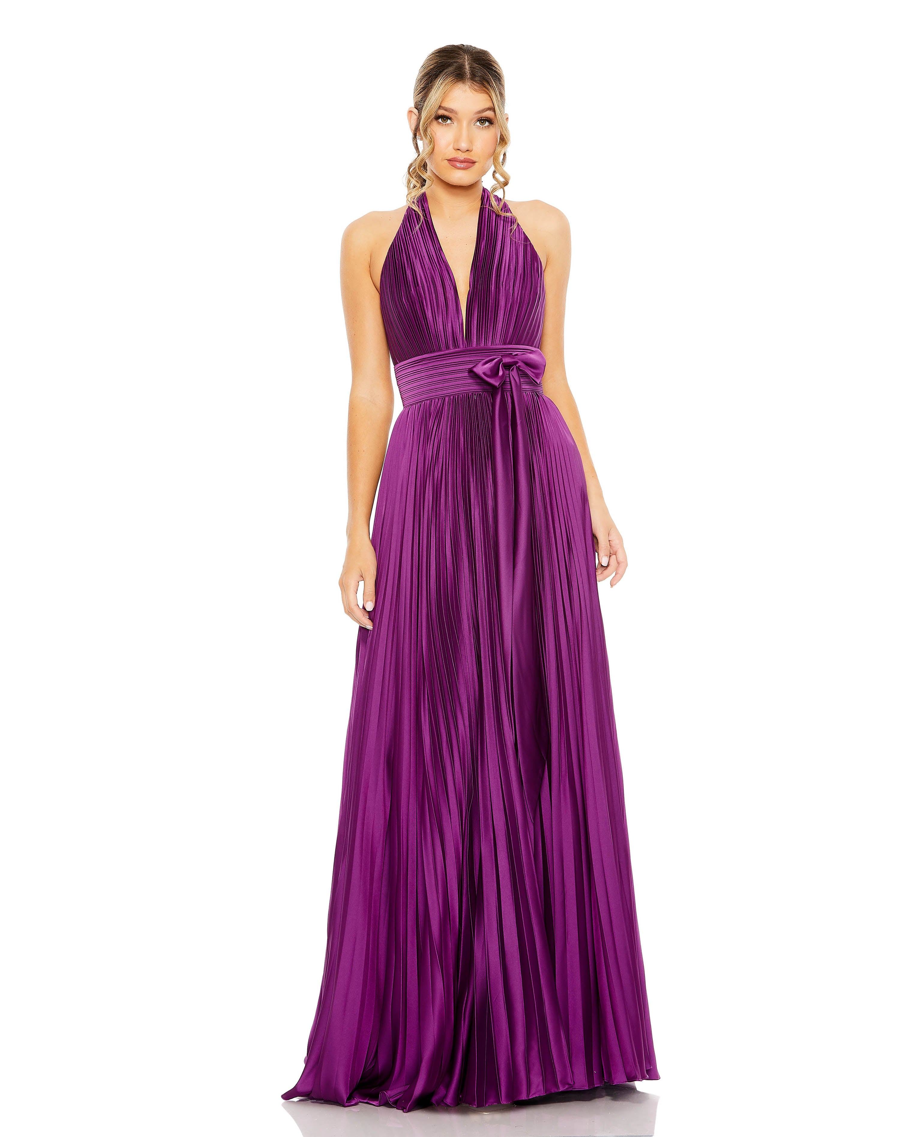  
<p>This stunning prom dress is sure to make any girl look chic and sophisticated with its flowing skirt and elegant silhouette. The Mac Duggal 11636 formal gown from The Dress Outlet is a beautiful design that will no doubt look just as lovely in ten years as it does now. This pleated halter dress features a pleated plunging neckline. This dress is perfect for dancing the night away at prom or homecoming and is ideal for everyone.</p>
 
<ul style="list-style-type: disc;">
<li>Fabric : Chiffon</li>
<li>Length : Full Length</li>
<li>Sleeve Style : Halter</li>
<li>Color : Plum</li>
<li>Sizes : 2, 4, 6, 8, 10, 12, 14, 16</li>
<li>Occasion : Prom Dresses, Formal Dresses, Homecoming Dresses</li>
</ul>