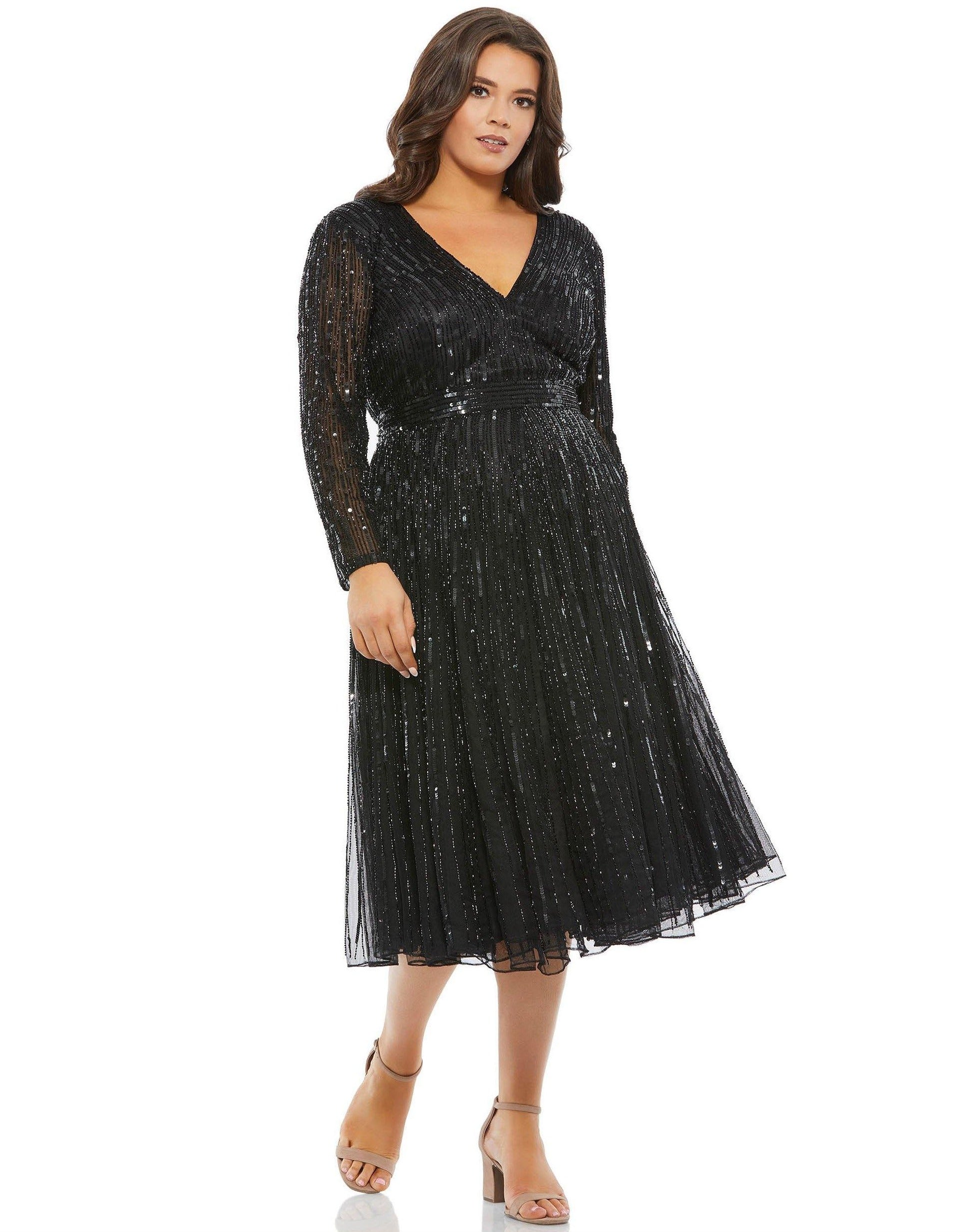 <p>This elegant plus size mother of the bride dress was embellished with linear sequins and pearls with a V-neckline. Featuring an illusion long sleeves with an oversized A-line.</p> <p> </p> <p>Fabric : Sequins</p> <p>Zipper Back</p> <p>Length : Tea Length</p> <p>Sleeve Style : Long Sleeve</p> <p>Colors : Black, Emerald Green</p> <p>Sizes : 14W, 16W, 18W, 20W, 22W, 24W</p> <p>Fully Lined</p> <p>Occasion : Cocktail, Evening Party, Mother of the Bride, Mother of the Groom, Church, Wedding Guest</p>