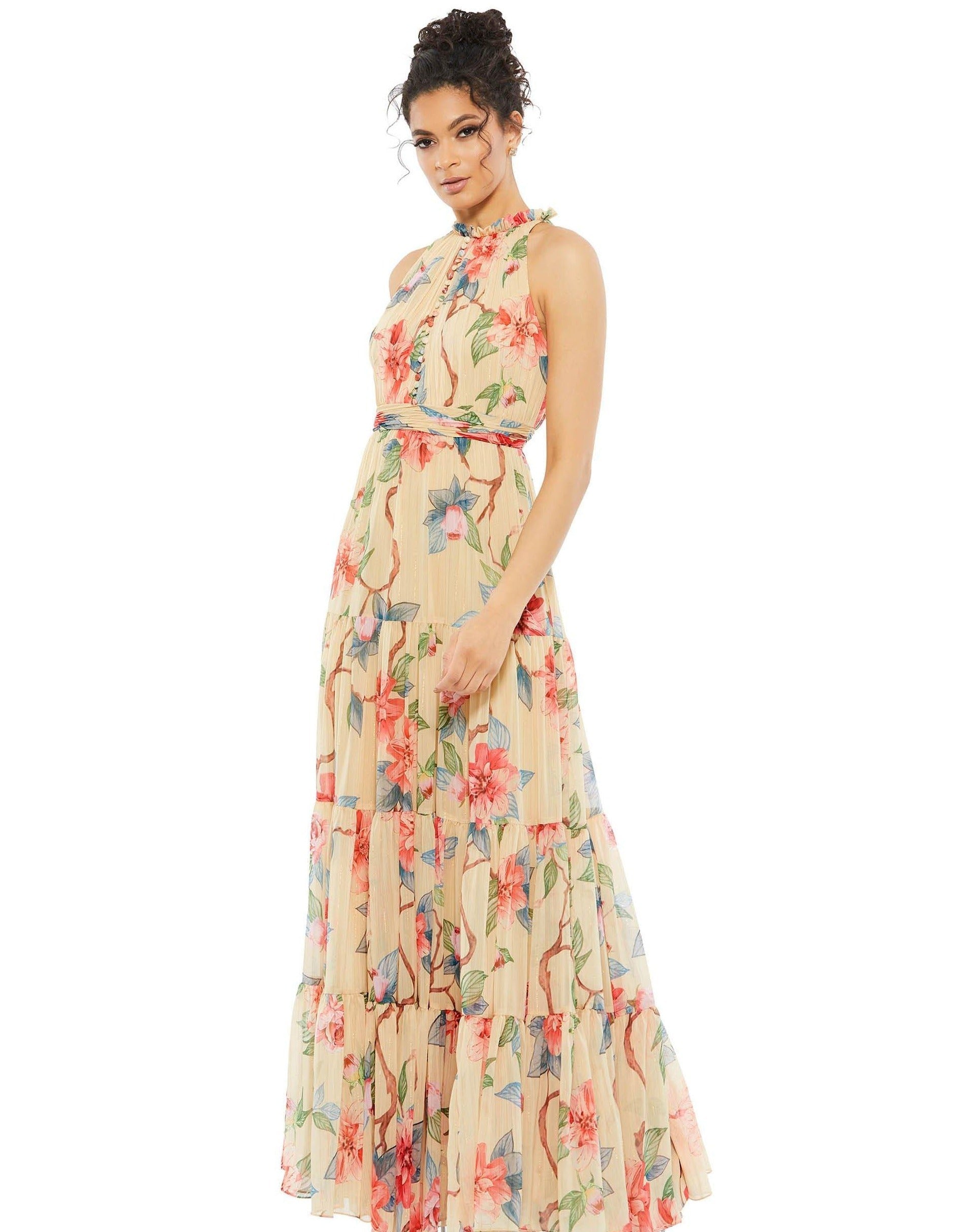 <p> This beautiful long dress features a high neckline with ruffle details in a corsage with a floral print.  Featuring an A-line silhouette with front buttons, pleated waistband and a tiered ruffle skirt.</p> <p><br> <br> Zipper Back</p> <p>Length : Full Length</p> <p>Sleeve Style :</p> <p>Color : Nude/Multi<br></p> <p>Sizes : 0, 2, 4, 6, 8, 10, 12, 14</p> <p>Fully Lined</p> <p>Occasion : Formal, Homecoming, Wedding Guest, Evening Party</p>