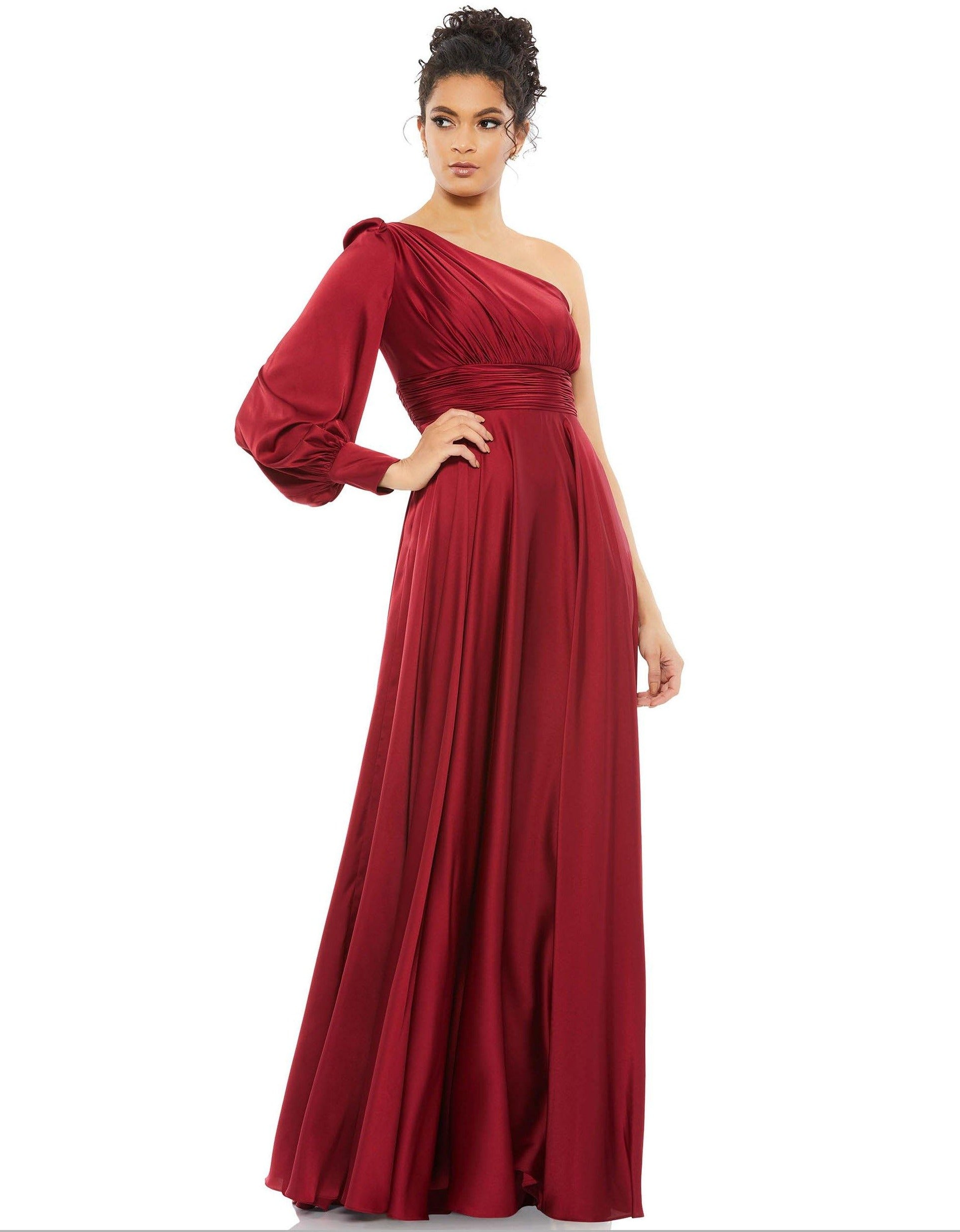 <p>This stunning evening long gown in satin fabric with a one shoulder and bishop sleeves with wide cuffs. The draped bodice fits snugly with a ripped camber belt complemented by a flared skirt and thin brush.</p> <p> </p> <p>Fabric : Satin</p> <p>Zipper Back</p> <p>Length : Full Length</p> <p>Sleeve Style : One Shoulder</p> <p>Colors : Burgundy, Midnight</p> <p>Sizes : 0, 2, 4, 6, 8, 10, 12, 14</p> <p>Fully Lined</p> <p>Occasion : Formal, Evening Party, Mother of the Bride, Mother of the Groom, Church, Wedding Guest</p>