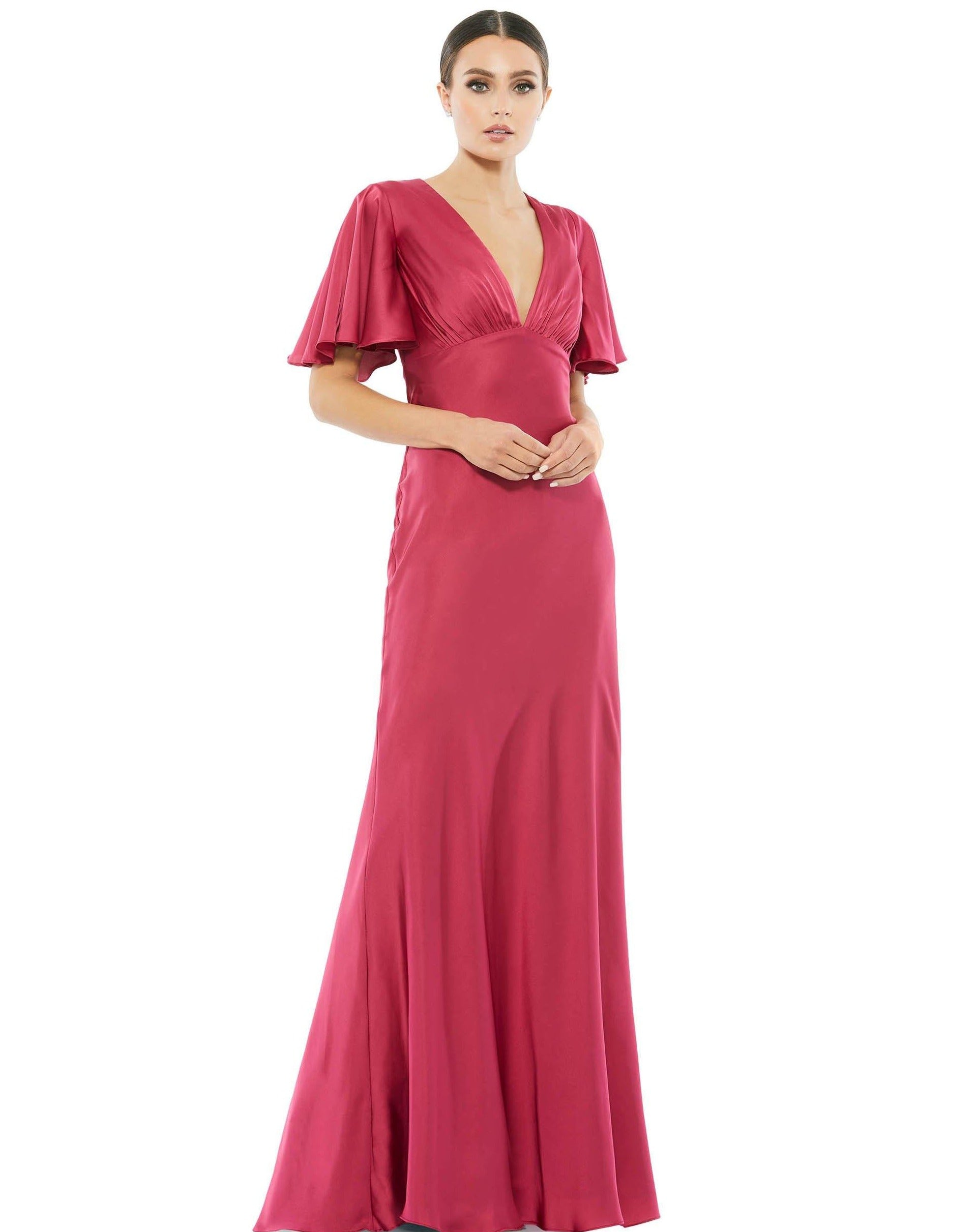 <p>This elegant formal dress features a deep V-neckline supported by short sleeves with ruffles in a full-length corsage. The skirt shows the silhouette and the back shows the full back.</p> <p> </p> <p>Fabric : Satin<br></p> <p>Zipper Back<br></p> <p>Length : Full Length</p> <p>Sleeve Style :  Short Sleeve</p> <p>Colors : Raspberry, <span data-mce-fragment="1">Black</span><br></p> <p>Sizes : 2, 4, 6, 8, 10, 12, 14</p> <p>Fully Lined</p> <p>Occasion : Formal, Evening Party, Mother of the Bride, Mother of the Groom, Church, Wedding Guest</p>