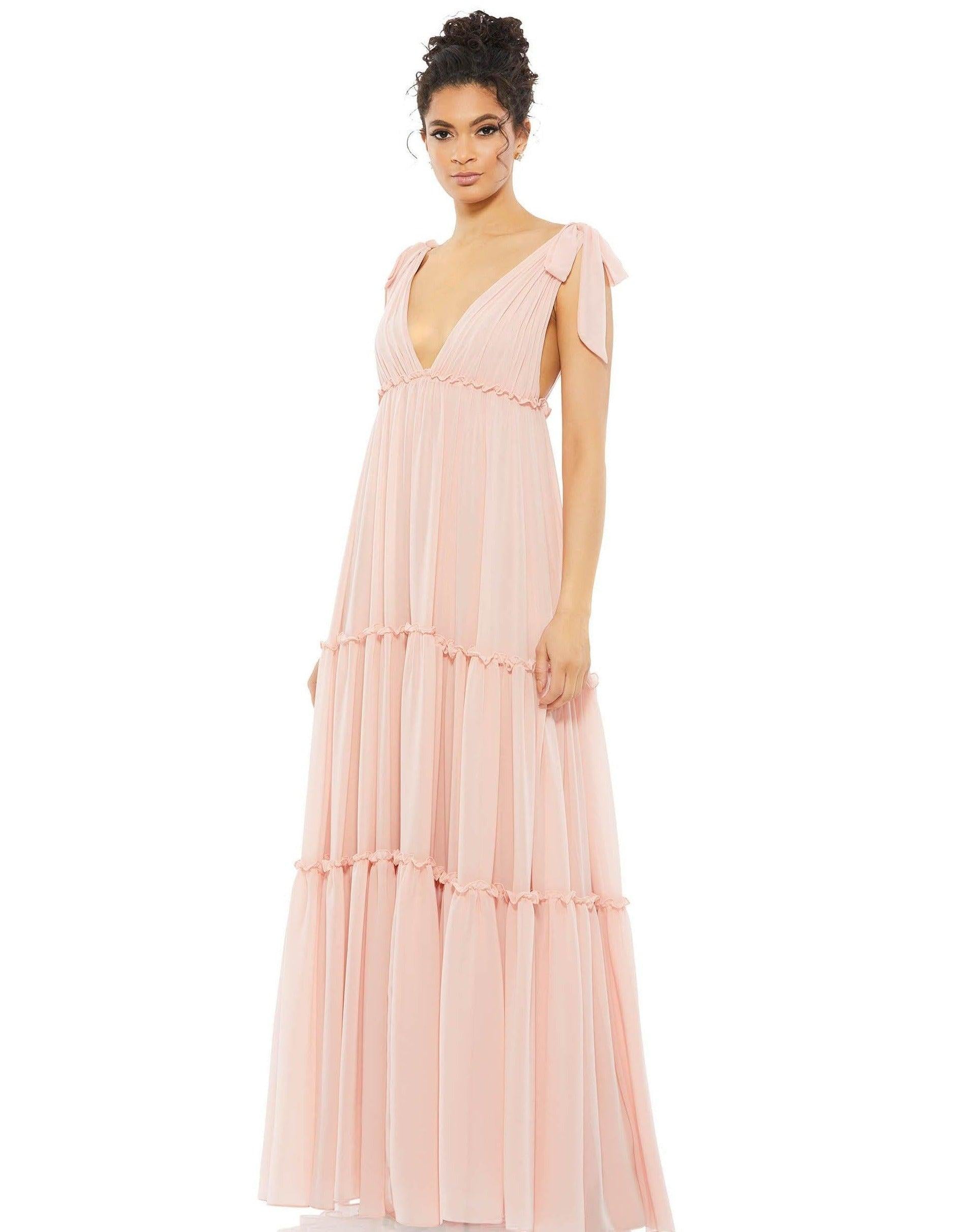 <p>This elegant maxi dress with ribbon accents on the shoulders features a royal bodice with a V-neckline. Featuring an open V-back with layers add a touch of charm to the flowing A-line skirt.</p> <p><br> Zipper Back</p> <p>Length : Full Length</p> <p>Sleeve Style : Sleeveless</p> <p>Color : Blush<br></p> <p>Sizes : 0, 2, 4 6, 8, 10, 12, 14</p> <p>Fully Lined</p> <p>Occasion :  Formal, Evening Party, Church, Wedding Guest</p>