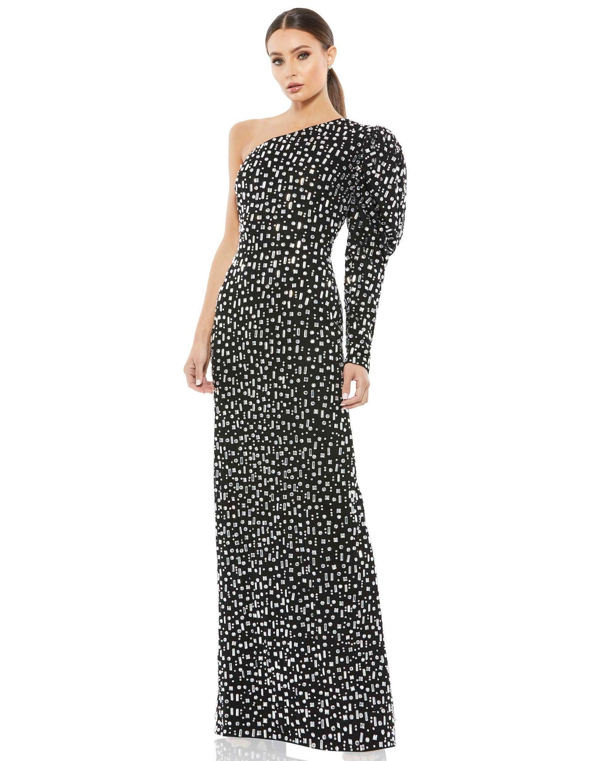 <p>This stunning long dress is perfect for any special occasion. The romantic sleeves make this gown a timeless and elegant choice. This dress has a one shoulder neckline with a center-back slit. Graceful and figure flattering, this outfit will surely make your ensemble unforgettable at any formal occasion.</p> <p> </p> <p>Length : Full Length</p> <p>Sleeve Style : One Shoulder</p> <p>Color : Black Silver</p> <p>Sizes : 0, 2, 4, 6, 8, 10, 12, 14, 16, 18</p> <p>Fully Lined</p> <p>Occasion : Prom, Formal, Evening Party, Homecoming, Wedding Guest, Red Carpet, Pageant</p>