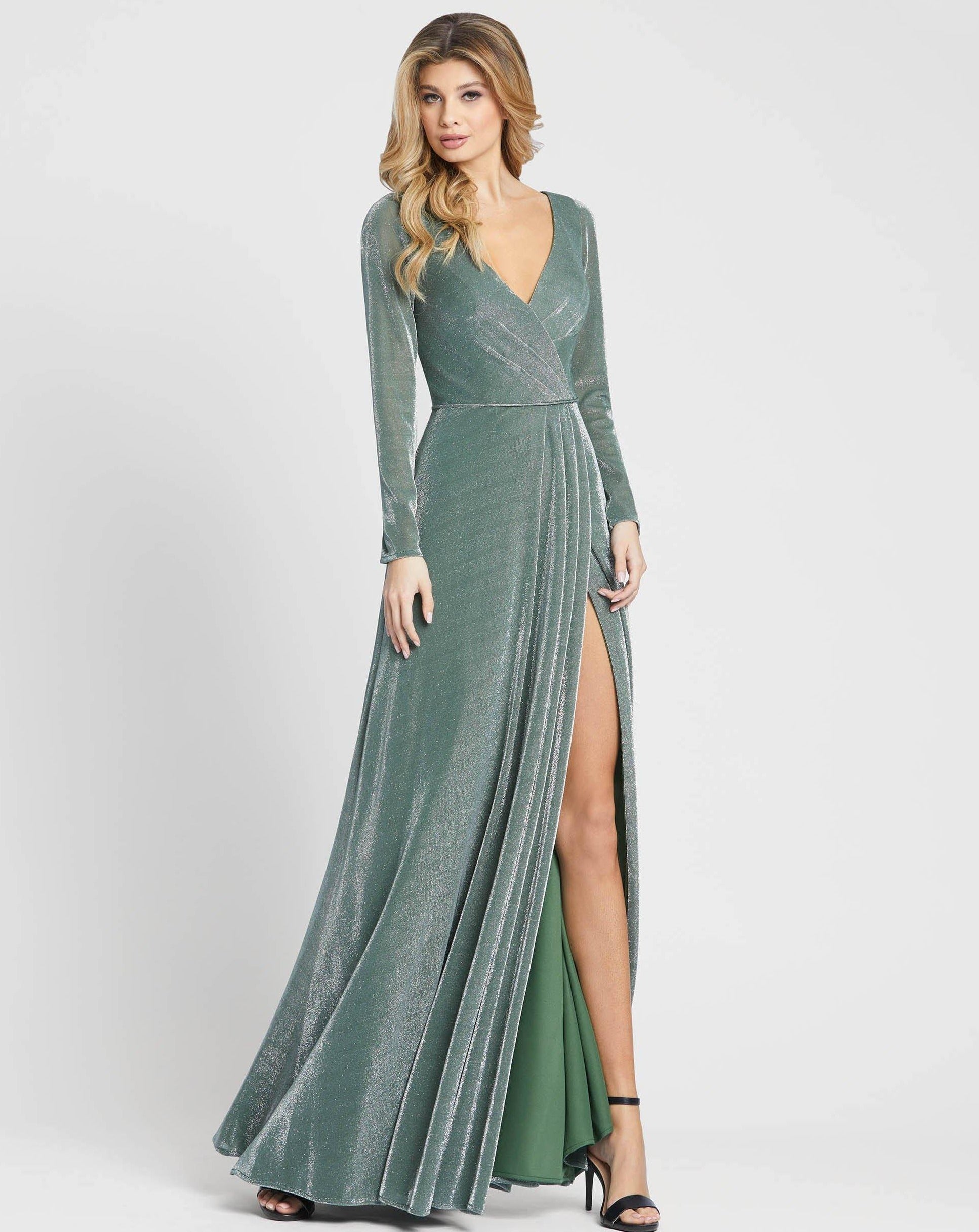 <p>This stunning gown adorned with pleats that wrap around the corsage features a V-neckline with long sleeves. The A-line skirt opens with hot slits and cascades to reveal a floor-length finish.</p> <p> </p> <p>Fabric : Velvet</p> <p>Zipper Back</p> <p>Length : Full Length</p> <p>Sleeve Style : Long Sleeve</p> <p>Colors : Jade Green, Black Gold</p> <p>Sizes : 2, 4, 6, 8, 10, 12, 14, 16, 18</p> <p>Fully Lined</p> <p>Occasion : Prom, Formal, Homecoming, Wedding Guest, Red Carpet, Pageant</p>