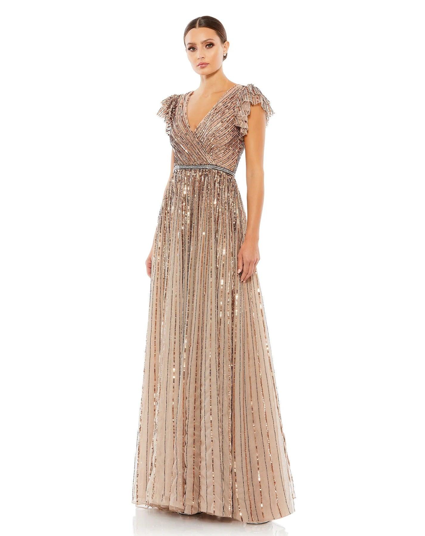 <p><span>Look absolutely gorgeous in this glitzy dress. A romantic V neckline, cap sleeves and a sheer back is adorned in fully embellished sparkly sequin accents. </span></p> <p> </p> <p>Zipper Back</p> <p>Length : Full Length</p> <p>Sleeve Style : Cap Sleeve</p> <p>Colors : Copper, Blackberry, Seamist</p> <p>Sizes : 2, 4, 6, 8, 10, 12, 16, 18, 20, 22, 24</p> <p>Fully Lined</p> <p>Occasion : Formal, Prom, Homecoming, Wedding Guest, Red Carpet, Pageant, Evening Party</p>