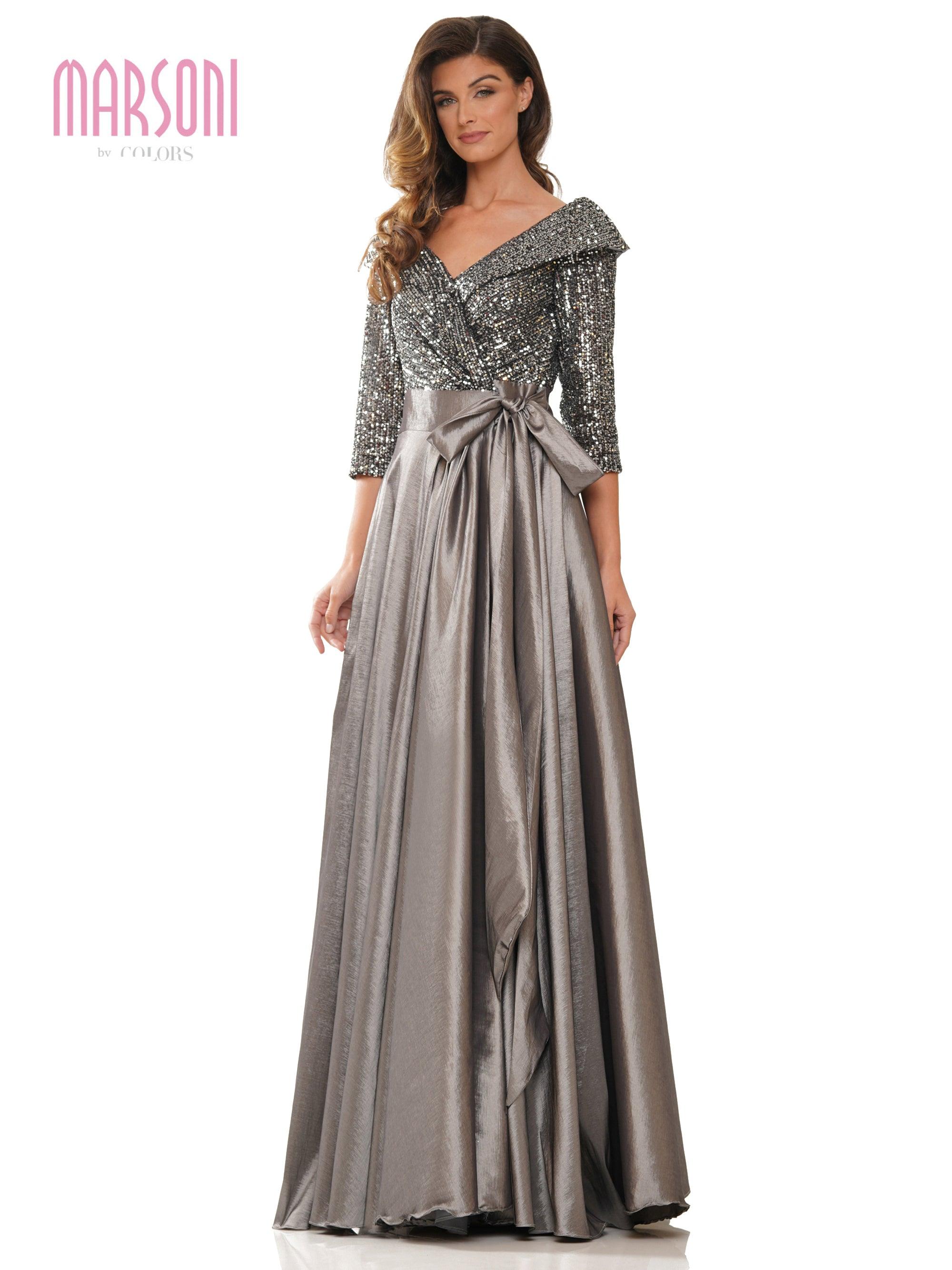 <p>The romantic sleeves make this gown a timeless and elegant choice. Treat yourself to something beautiful that will last a lifetime with this mother of the bride dress. Perfect for formal, evening party, church and other special occasion and mother of the bride.<br><br><br>Fabric : Sequins, Taffeta<br><br>Length : Full Length<br><br>Sleeve Style : 3/4 Sleeve<br><br>Colors : Charcoal, Navy, Wine<br><br>Sizes : 4, 6, 8, 10, 12, 14, 16, 18, 20, 22, 24, 26<br><br>Fully Lined<br><br>Occasion : Formal, Evening Party, Mother of the Bride, Church, Wedding Guest</p>