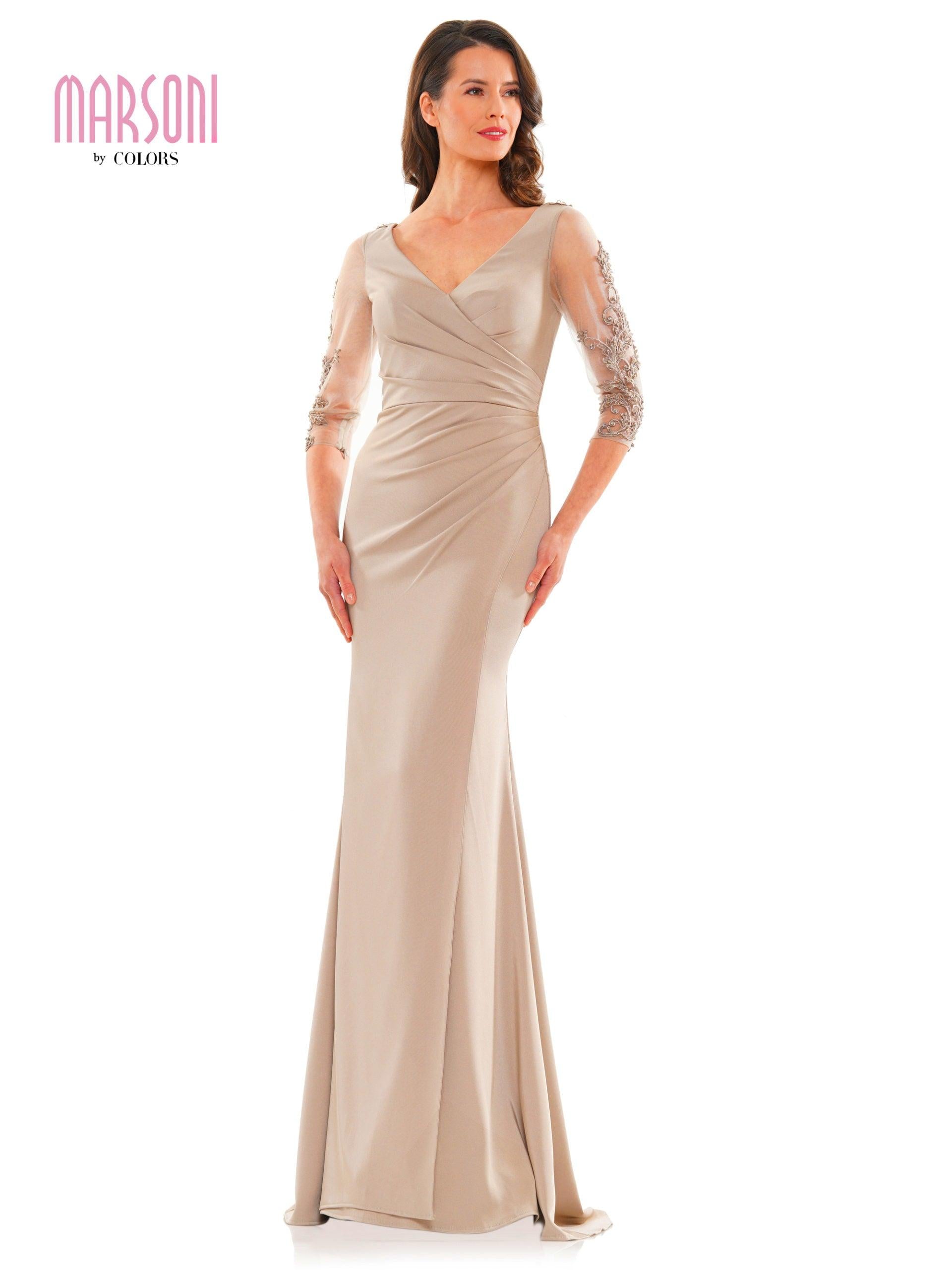 <p>This stunning Long formal dress is perfect for any special occasion. The romantic sleeves make this gown a timeless and elegant choice. Featuring a 3/4 sleeve V-neckline with a beaded appliques perfect for any special occasion.</p> <p> </p> <p>Fabric : Faille</p> <p>Zipper Back</p> <p>Length : Full Length</p> <p>Sleeve Style : 3/4 Sleeves</p> <p>Color : Taupe, Navy, Deep Green</p> <p>Sizes : 6, 8, 10, 12, 14, 16, 18, 20, 22, 24, 26</p> <p>Fully Lined</p> <p>Occasion : Formal, Evening Party, Church, Wedding Guest, Mother of the Bride, Mother of the Groom</p>