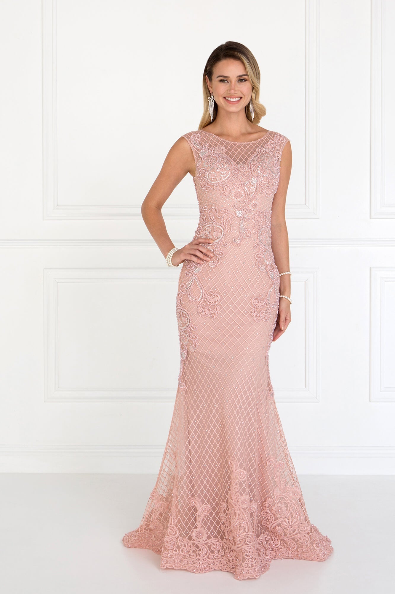 This long dress features an illusion bateau neckline with cap sleeves. The fitted bodice is richly ornate with bead and jewel embellishments. The skirt has a sheath silhouette that finishes in a sweep train. Perfect for prom, homecoming, formal or any special occasion.<br><br><br>Fabric : Mesh<br><br>Closure : Side Zipper<br><br>Length : Full Length<br><br>Sleeve : Cap Sleeve<br><br>Color : Dusty Rose<br><br>Sizes : XS, S, M, L, XL, 2XL, 3XL<br><br>Fully Lined<br><br>Soft Cup Inserts<br><br>Occasion : Formal, Prom, Homecoming, Wedding Guest, Evening Party, Red Carpet, Pageant, Special Occasion