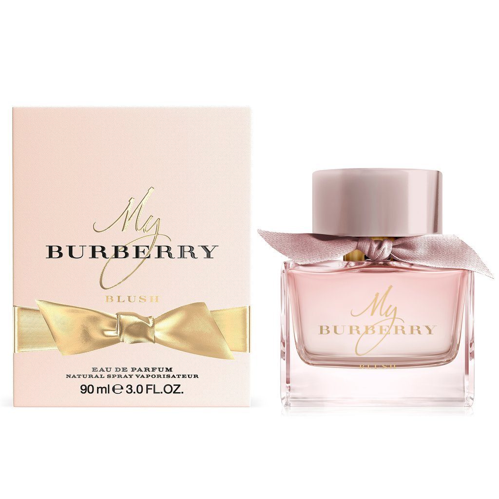 Stepping back into a London garden awakening in the first light of day, My Burberry Blush captures the senses as blossoming flowers pop with spirited energy. A fruity floral interpretation of the iconic Eau de Parfum with a sparkling twist. The fragrance opens with glazed pomegranate and vibrant lemon. Delicate rose petal notes are lifted with crisp apple, while a base of jasmine and wisteria round off the scent for an intensely feminine touch. The My Burberry glass bottle is based on the same design principles and craftsmanship as the Burberry trench coat, fusing British innovation and heritage with a timeless modernity. Simple yet bold, the design is shaped to echo the folds and soft pleats of the Burberry trench coat. The bold horn-finish cap reflects the distinctive hand-stitched buttons of the trench coat.