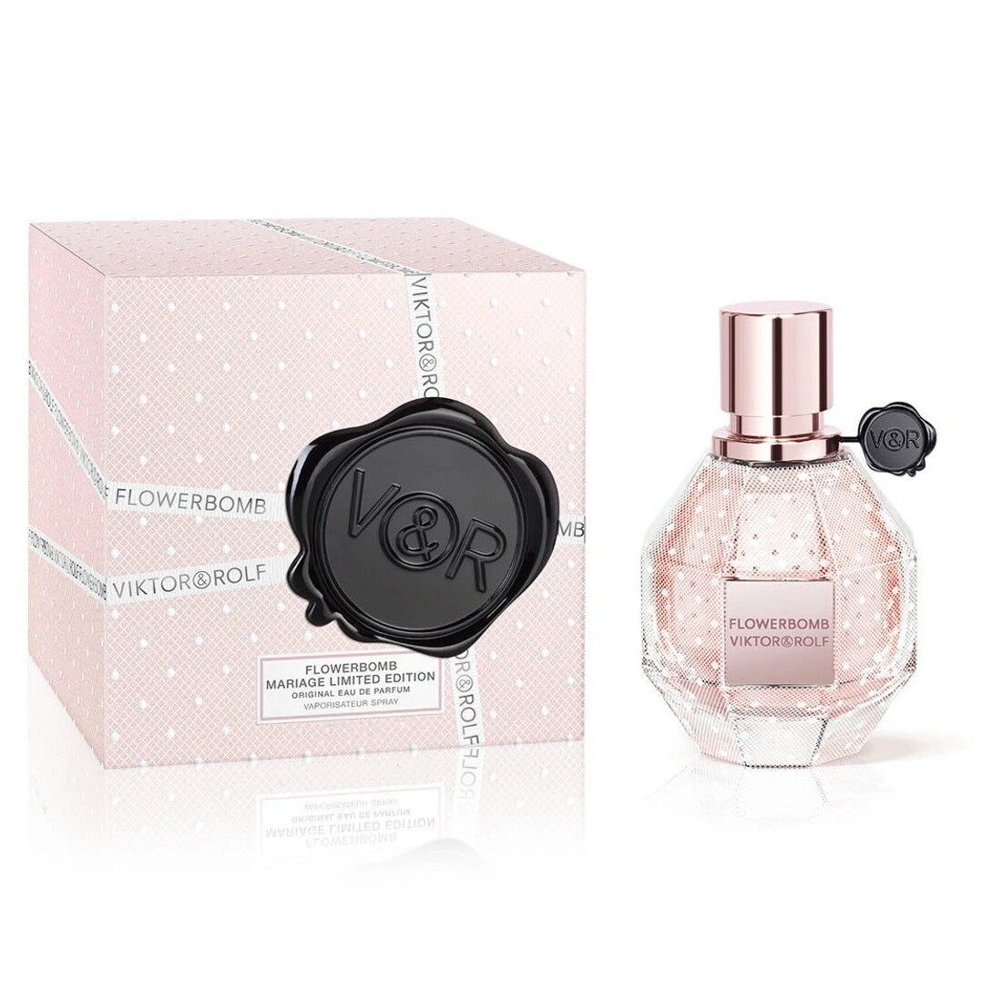<span data-mce-fragment="1">Flowerbomb Mariage Edition is dressed in a white, couture plumetis veil.</span><br data-mce-fragment="1"><span data-mce-fragment="1">The limited-edition bottle contains the classic Flowerbomb fragrance, an explosion of thousands of flowers with the power to turn everything positive.</span><br data-mce-fragment="1"><span data-mce-fragment="1">Grounded in patchouli and vanilla, and enchanted with a whirl of jasmine and rose, Flowerbomb is the ultra-addictive women's fragrance, perfect for this very special time.</span><br data-mce-fragment="1"><br data-mce-fragment="1"><span data-mce-fragment="1">Experience this intoxicating perfume for yourself, the bride, or her bridesmaids.</span><br data-mce-fragment="1"><br data-mce-fragment="1"><strong data-mce-fragment="1">Fragrance Family:</strong><span data-mce-fragment="1"> Floral</span><br data-mce-fragment="1"><strong data-mce-fragment="1">Top Notes:</strong><span data-mce-fragment="1"> Cattleya Orchid, Freesia, and Centifolia Rose</span><br data-mce-fragment="1"><strong data-mce-fragment="1">Middle Notes:</strong><span data-mce-fragment="1"> Sambac Jasmine and India Osmanthus</span><br data-mce-fragment="1"><strong data-mce-fragment="1">Base Notes:</strong><span data-mce-fragment="1"> Patchouli and Vanilla</span>