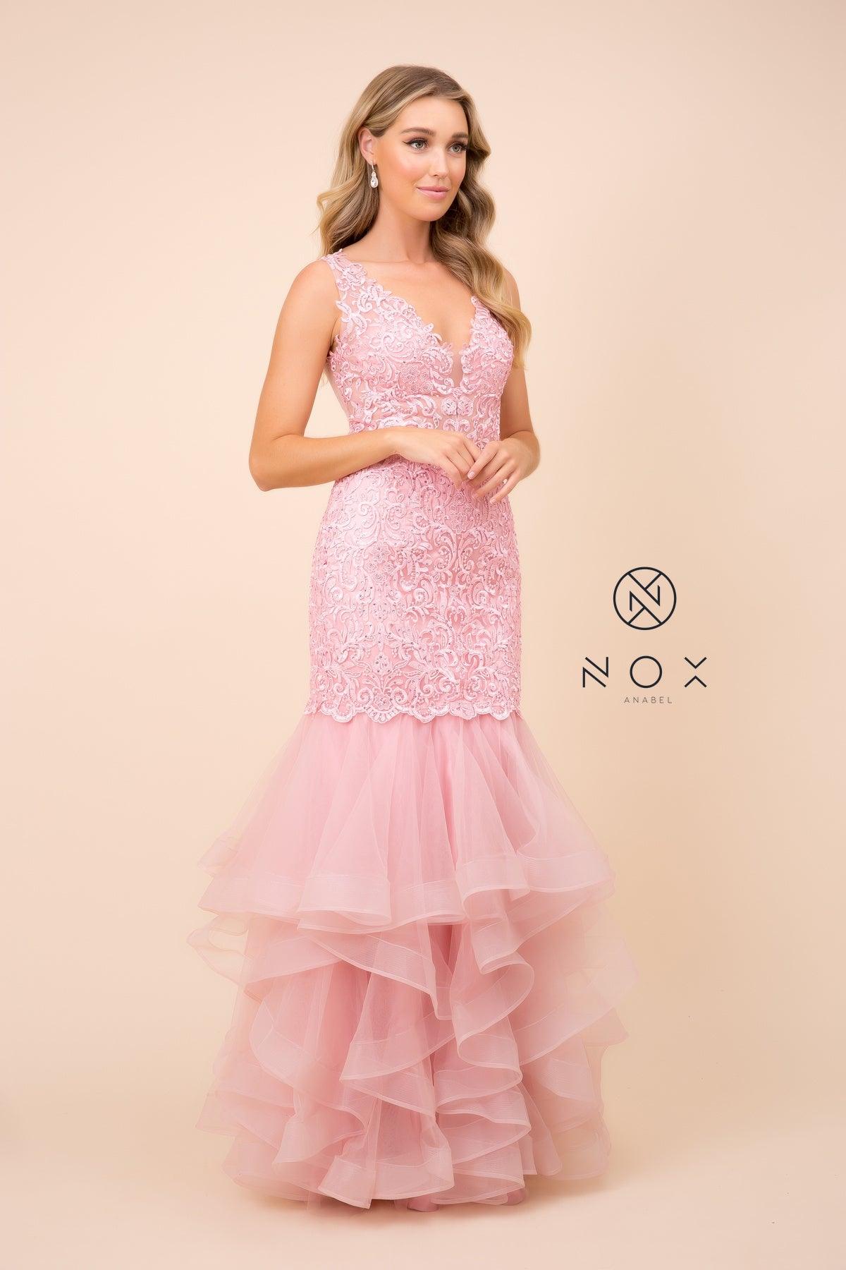 <p><span><br>This evening dress features a deep V-neckline secured with a sheer inset panel, beautiful beaded lace bodice, embellished sheer back, full length mermaid tulle skirt with a ruffled hemline, and a zipper closure.</span></p> <p> </p> <p><span>Fabric : Lace, Tulle<br><br>Closure : Back zipper<br><br>Sleeve Style : Sleeveless<br><br>Colors : Steel Gray, Rose<br><br>Size : XS, S, M, L, XL, 2XL<br><br>Fully Lined<br><br>Occasion : Formal, Prom, Homecoming, Special Occasion</span></p> 