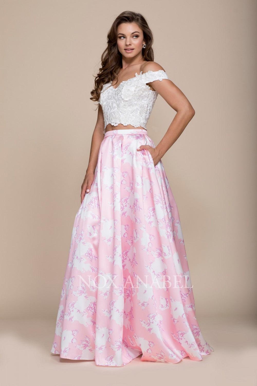 <p> </p> <p><span>Command attention wearing this pink two-piece crop top floral print dress. This long evening gown features a white off the shoulder crop-top with lovely floral embroidery, versatile side pockets, the long skirt is decorated with a lovely pink floral print, and a zipper closure.</span></p> <p> </p> <p>Fabric Content : 100% Polyester</p> <p><span>Sleeve Style : Sleeveless</span></p> <p><span>Length : Floor Length</span></p> <p><span>Colors : Pink, Floral Patterns</span></p> <p><span>Sizes : XS, S, M, L, XL, 2XL</span></p> <p><span>Occasion : Formal, Prom, Homecoming, Special Occasion</span></p> 