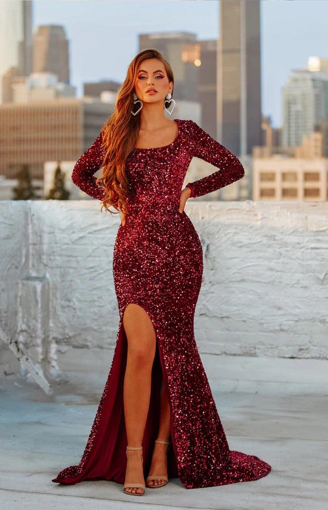 <p>The romantic sleeves make this gown a timeless and elegant choice. This mermaid fit dress has a scoop neckline with sexy high slit and ends with a train. Say yes to this dress now. The dress is sophisticated with a little bit of sexy to make heads turn.</p> <p> </p> <p>Fabric : Sequins</p> <p>Zipper Back</p> <p>Length : Full Length</p> <p>Sleeve Style : Long Sleeve</p> <p>Color : Deep Red</p> <p>Sizes : 0, 2, 4, 6, 8, 10, 12, 14, 16, 18</p> <p>Fully Lined</p> <p>Occasion : Prom, Formal, Evening Party, Homecoming, Wedding Guest, Red Carpet, Pageant</p>