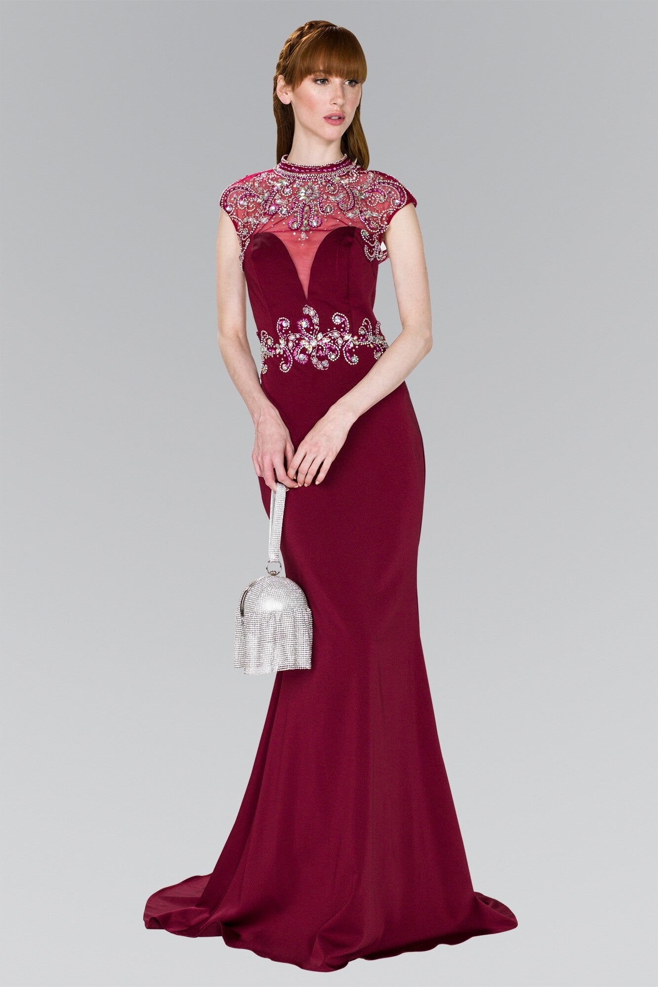 This stunning long dress features cap sleeve high neckline with with an jeweled high illusion over a plunging sweetheart neckline, jewel waistband and made of rome jersey. Perfect for prom, homecoming, formal or any special occasion.<br><br><br>Fabric : Rome Jersey<br><br>Closure : Zipper Back<br><br>Length : Full Length<br><br>Sleeve : Cap Sleeve<br><br>Color : Burgundy<br><br>Sizes : XS, S, M, L, XL, 2XL, 3XL<br><br>Fully Lined<br><br>Soft Cup Inserts<br><br>Occasion : Formal, Prom, Homecoming, Wedding Guest, Evening Party, Red Carpet, Pageant, Special Occasion