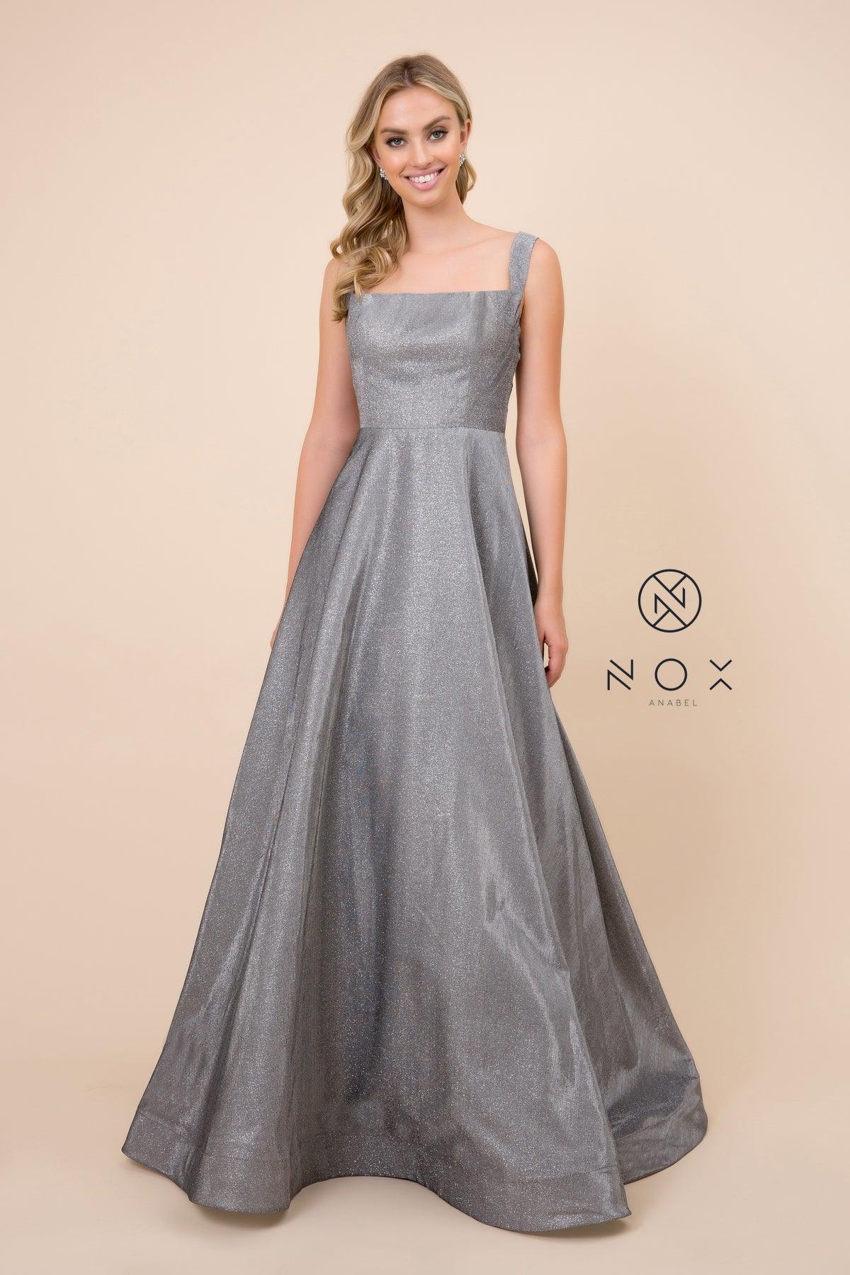 <p> </p> <p>This gorgeous long dress features a r<span>hinestone embellished spaghetti strap fit and flare design.</span><span> This dress is </span><span>perfect for prom party or any special occasion.</span></p> <p> </p> <p>Closure : Zipper Back</p> <p>Length : Floor Length</p> <p>Sleeve Style : Sleeveless</p> <p>Colors : Gray, Royal </p> <p>Sizes : XS, S, M, L, XL, 2XL</p> <p>Fully Lined</p> <p>Occasion : Formal, Prom, Homecoming, Special Occasion</p> 