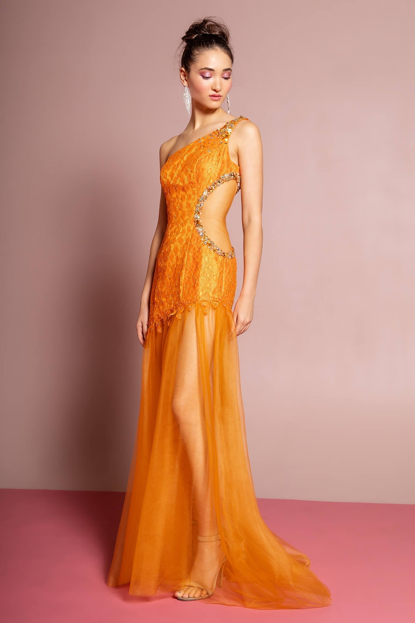 <p>This long dress features a one shoulder and a semi-open back. Graced with an alluring jewel-trimmed mesh cutout on one side of the midriff, the sheath skirt displays an asymmetrical scalloped hem before the tulle material flows wonderfully down to a sweep train. . Perfect for formal, evening party or any special occasion.<br><br></p> <p><br>Fabric : Lace, Tulle<br><br>Closure : Side Zipper<br><br>Length : Full Length<br><br>Sleeve Style : One Shoulder<br><br>Colors : Orange, Black<br><br>Sizes : XS, S, M, L, XL, 2XL, 3XL<br><br>Fully Lined<br><br>Soft Cup Inserts<br><br>Occasion : Formal, Prom, Homecoming, Wedding Guest, Evening Party, Red Carpet, Pageant, Special Occasion</p> 